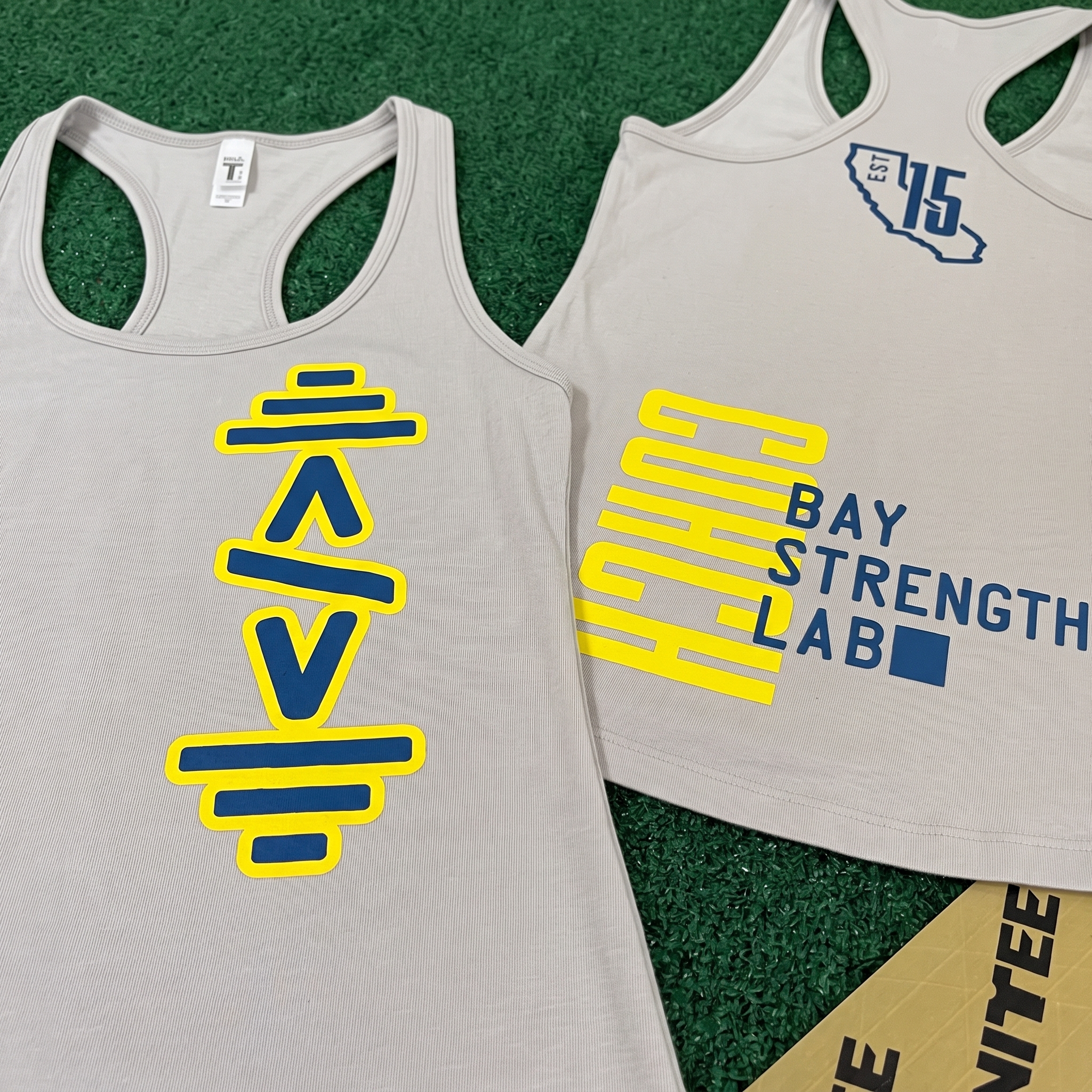 Bay Area Strength Lab grey training tanks with stacked lab icon and vertical Bay Strength Lab print