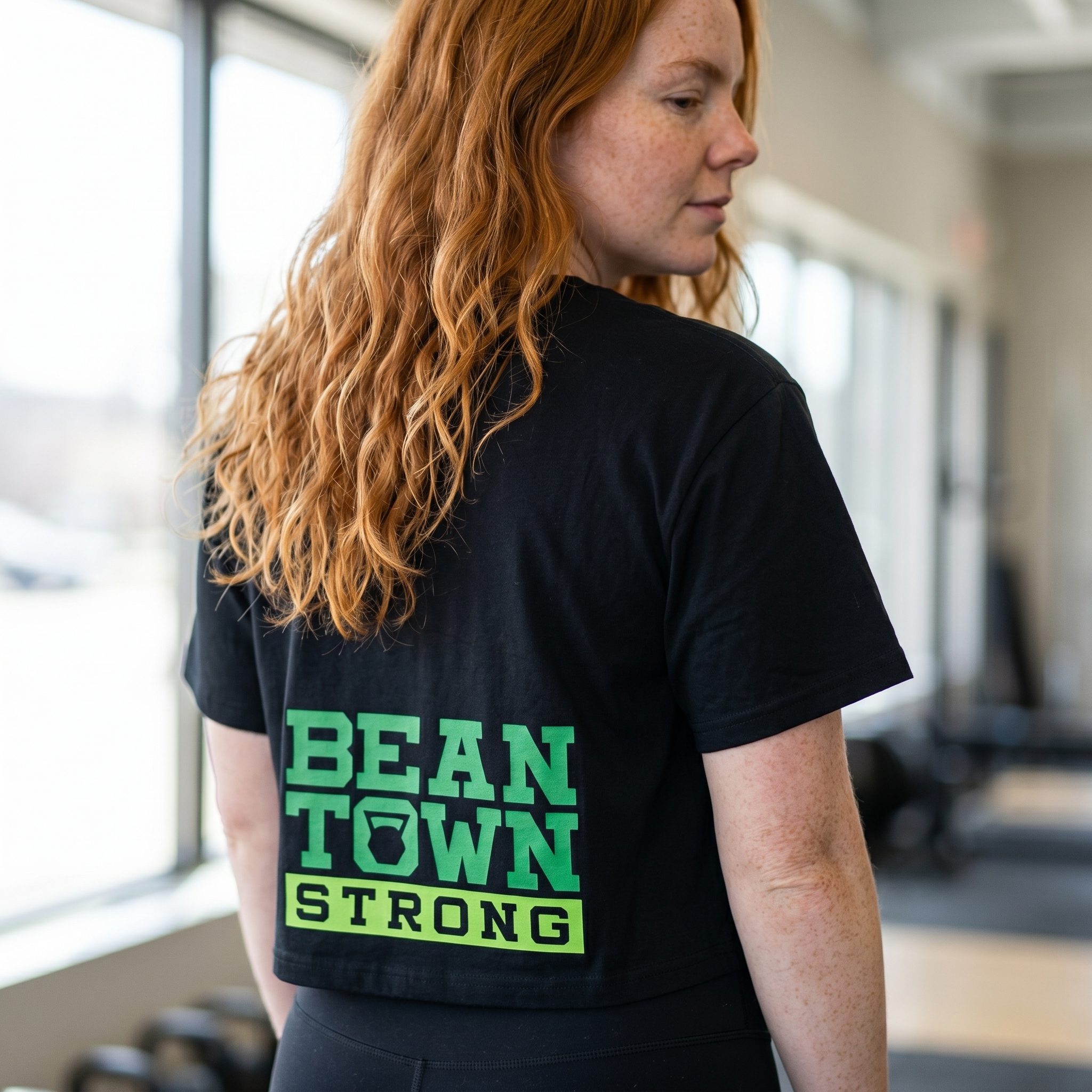 Beantown Strength black crop tee with back print placement