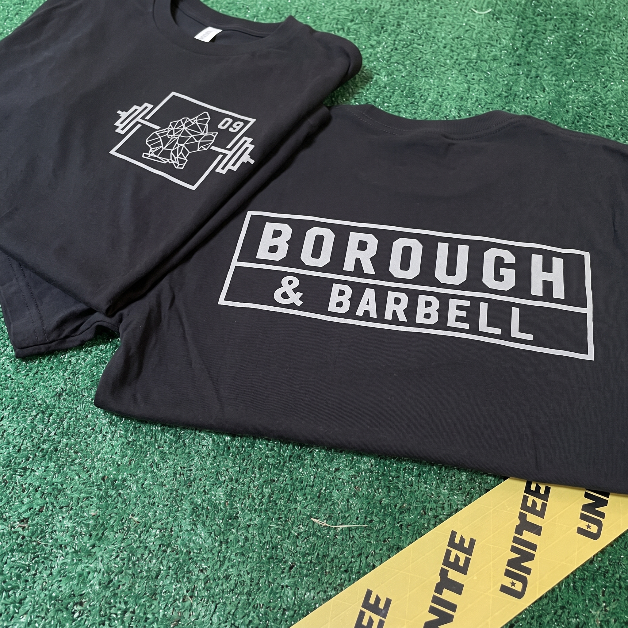 Borough & Barbell neon hoodie with bridge and skyline graphic
