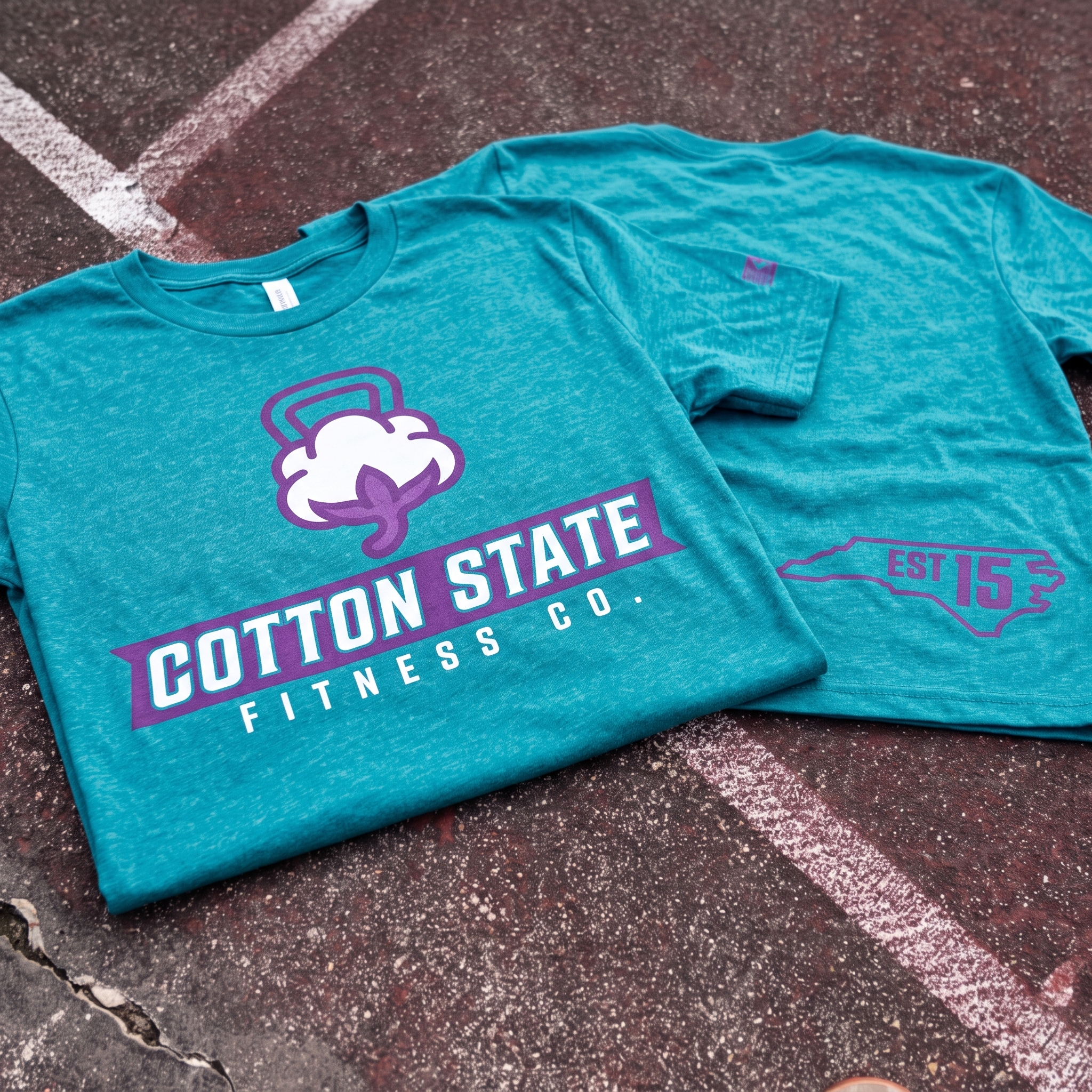 Cotton State Fitness Co. teal tee with Cotton State front print and North Carolina back print
