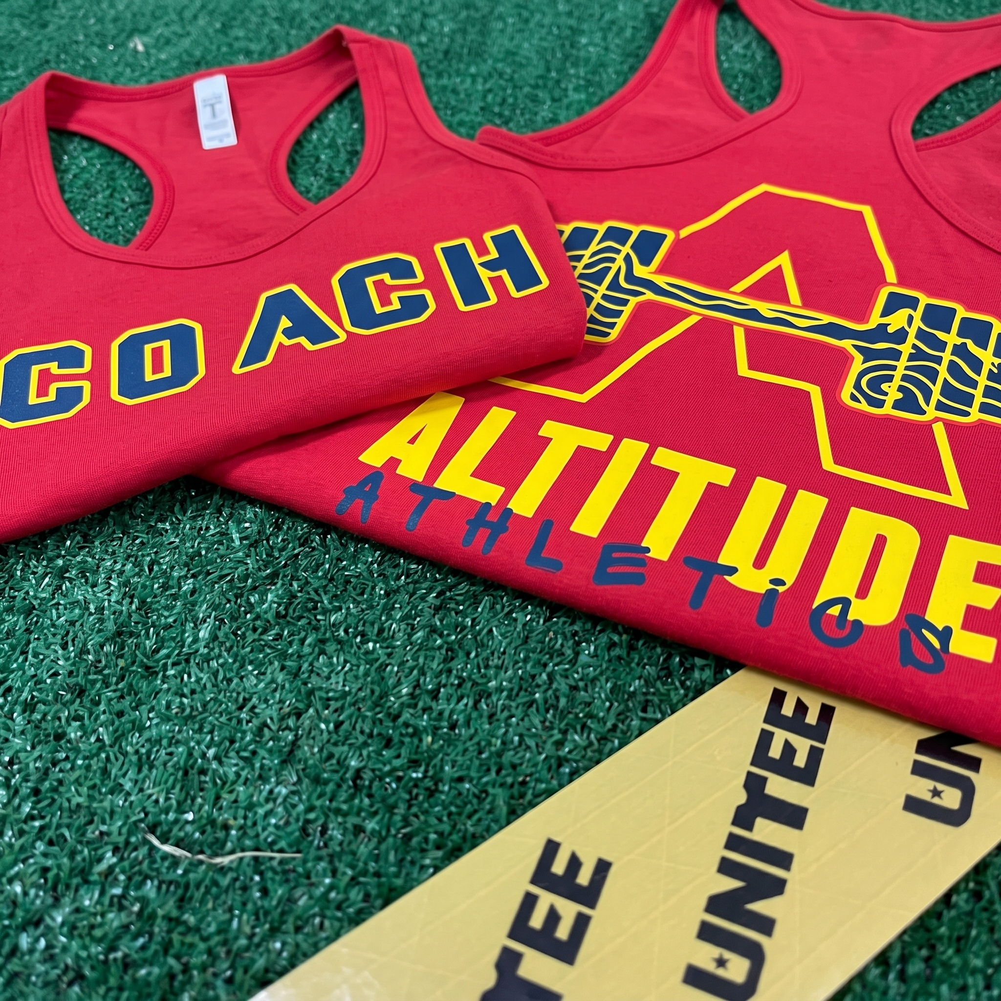 Altitude Athletics red coach tank and red A mark training tank