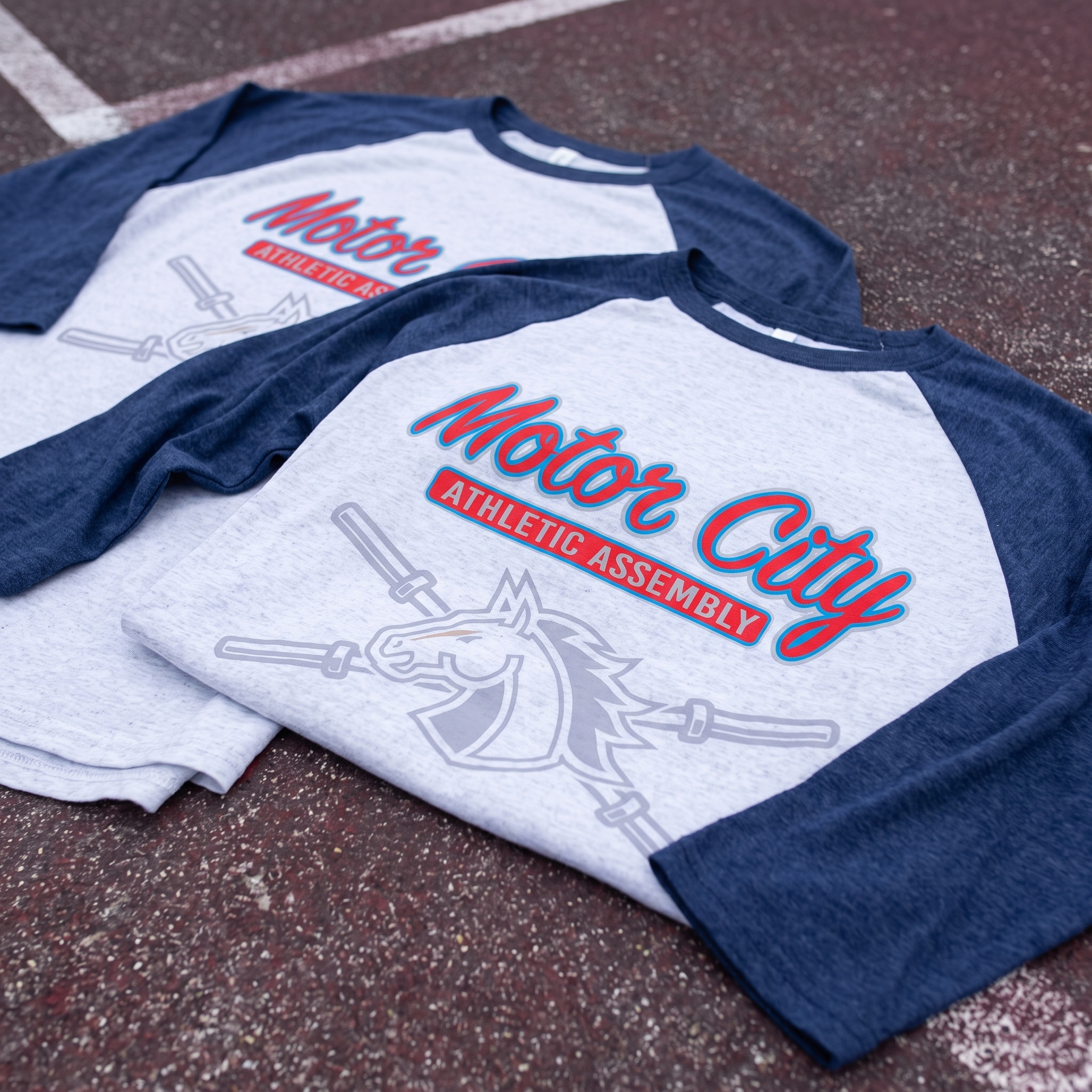 Motor City Athletic Assembly blue and grey raglan shirts