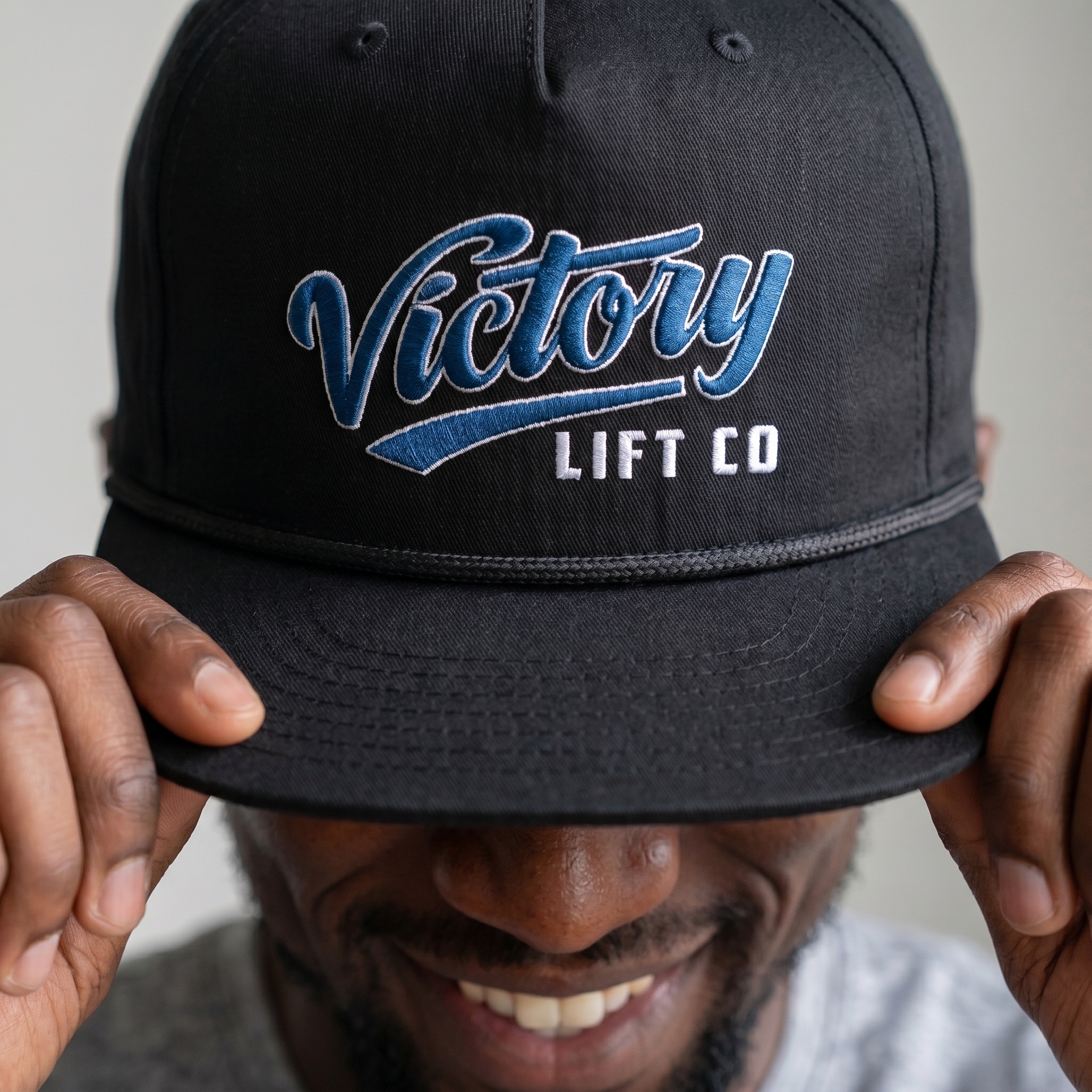 Victory Lift Co black rope hat with embroidered script logo