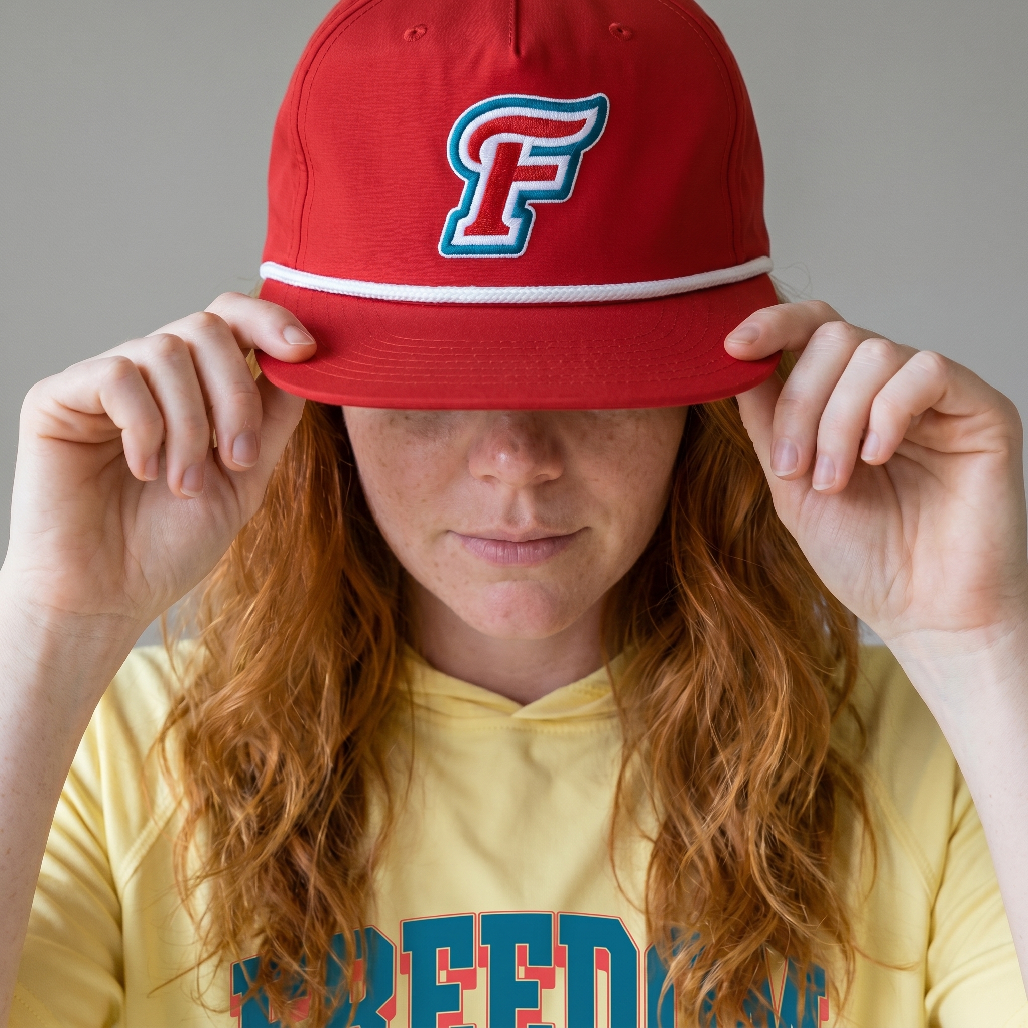Red Freedom Fitness rope cap with embroidered F monogram patch