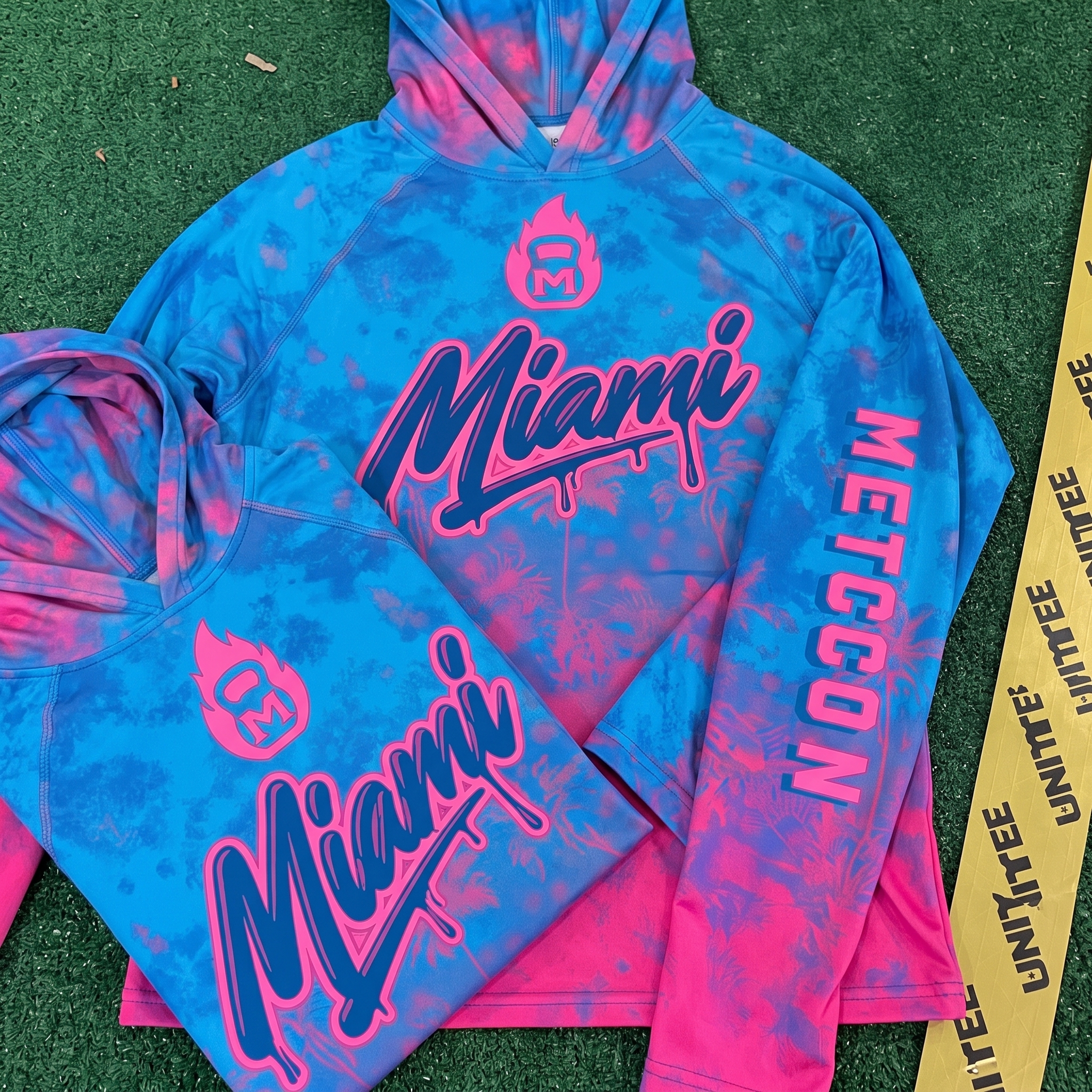 Miami Metcon blue and pink hooded performance tops with sleeve Metcon print