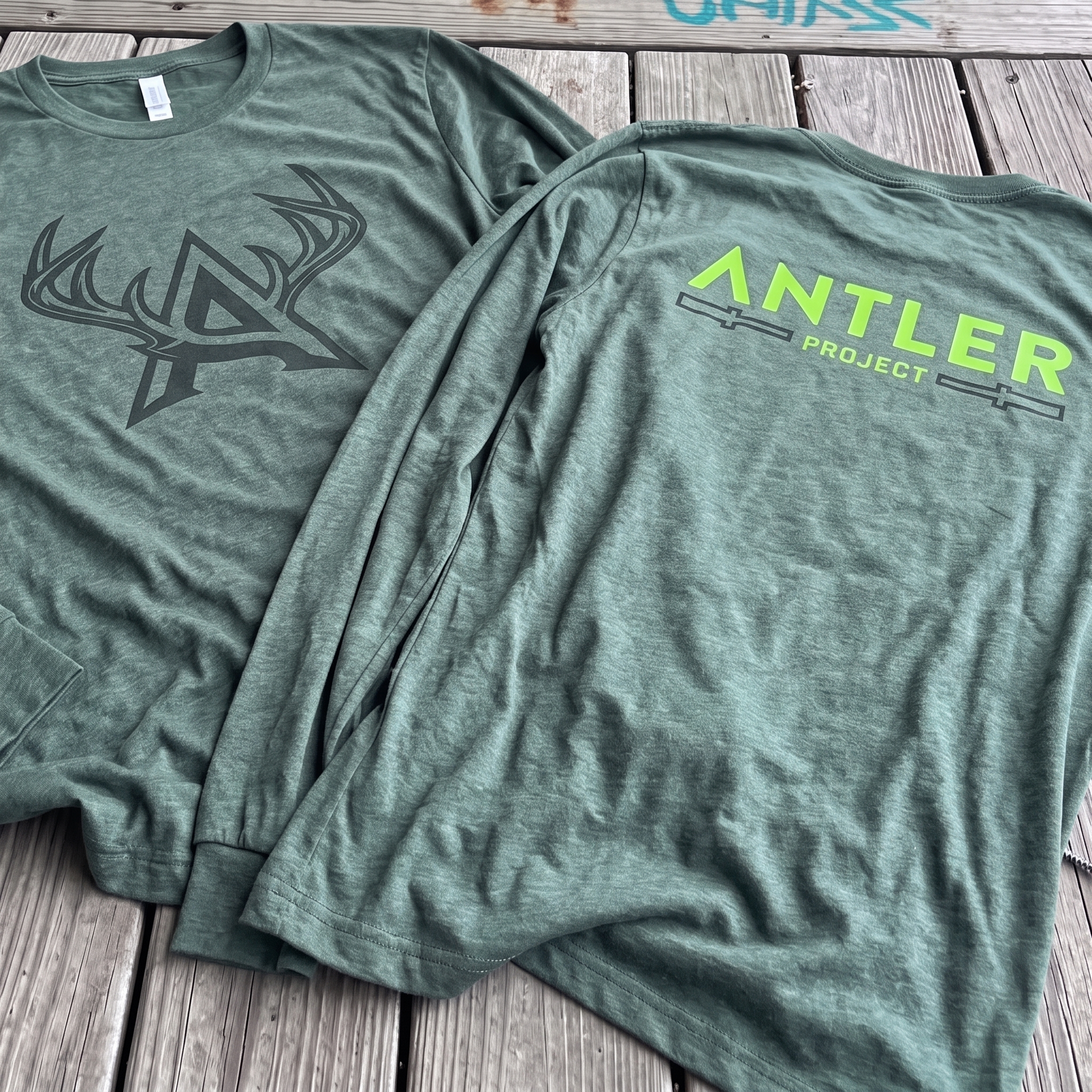 Forest green Antler Project long sleeve shirts with front antler mark and back wordmark