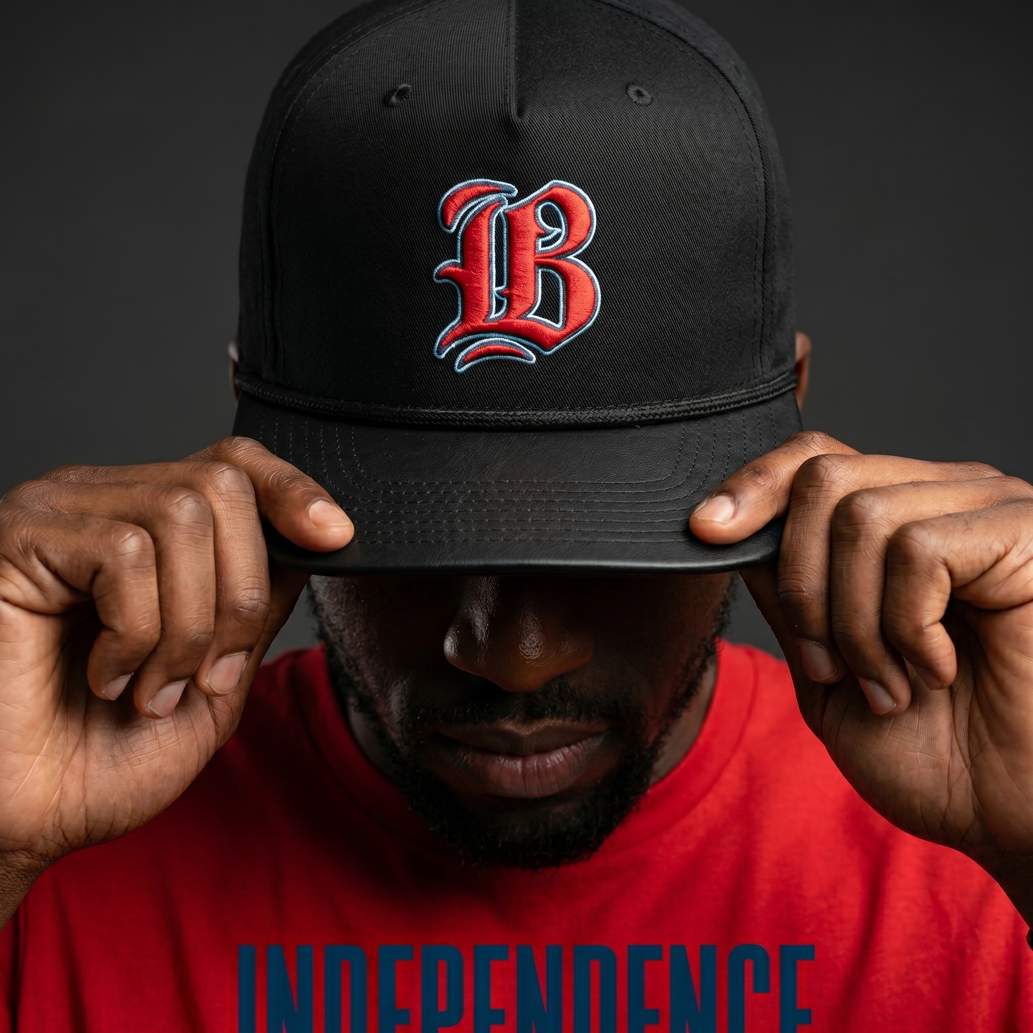 Black Independence Barbell rope cap with red and blue blackletter IB embroidery