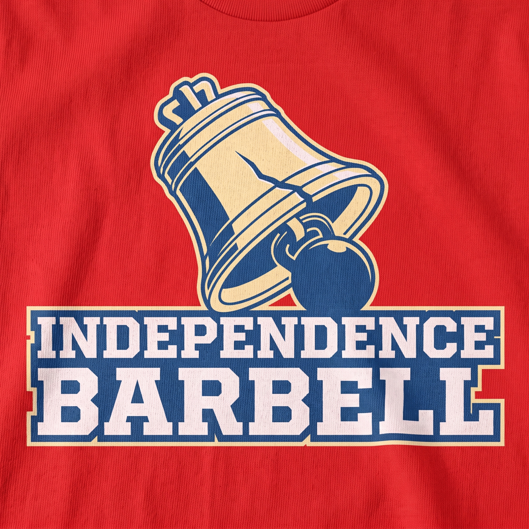Close-up of Independence Barbell screen printed logo with Liberty Bell icon, navy and cream ink, block typography, and red garment base