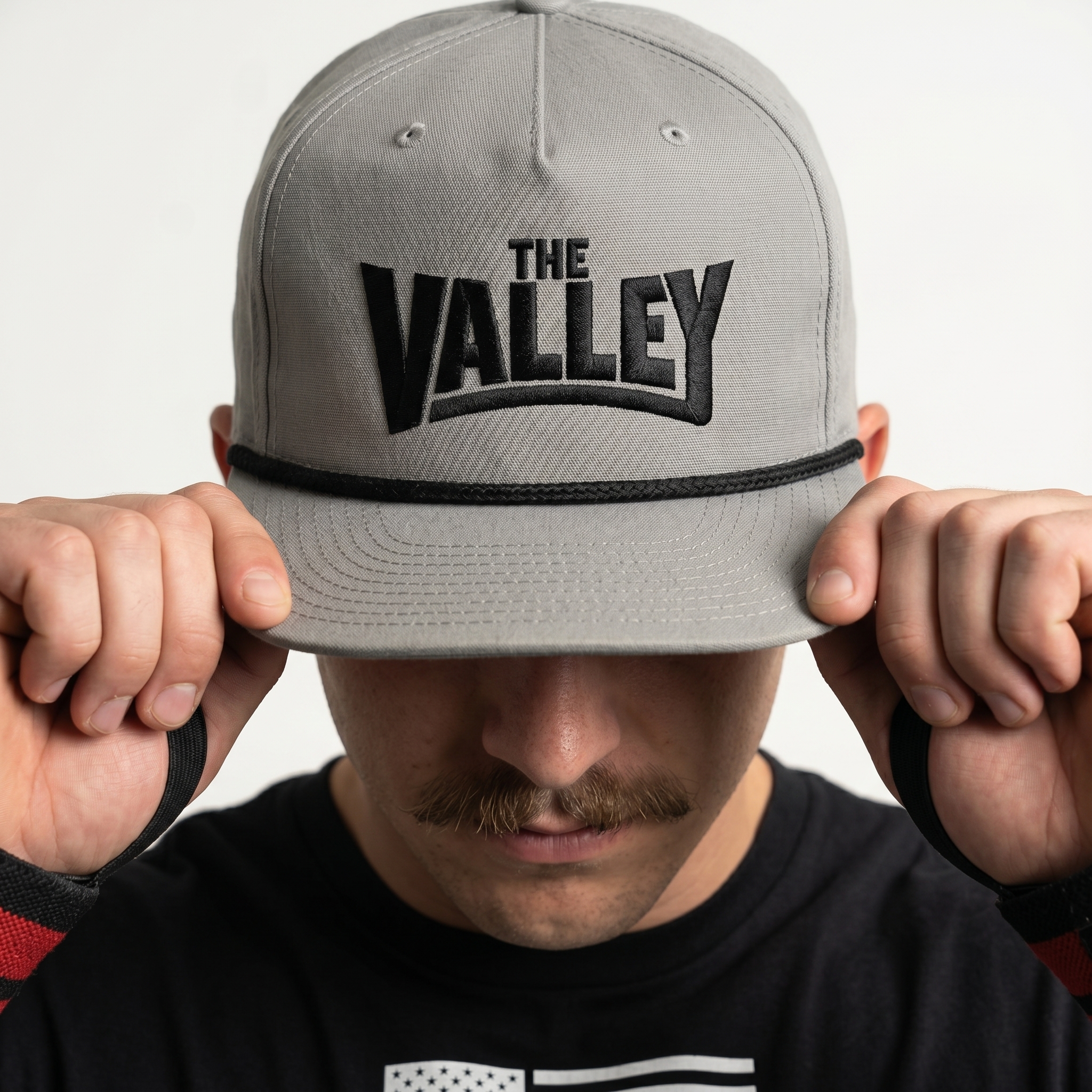 Grey The Valley rope cap with black embroidery and black rope detail