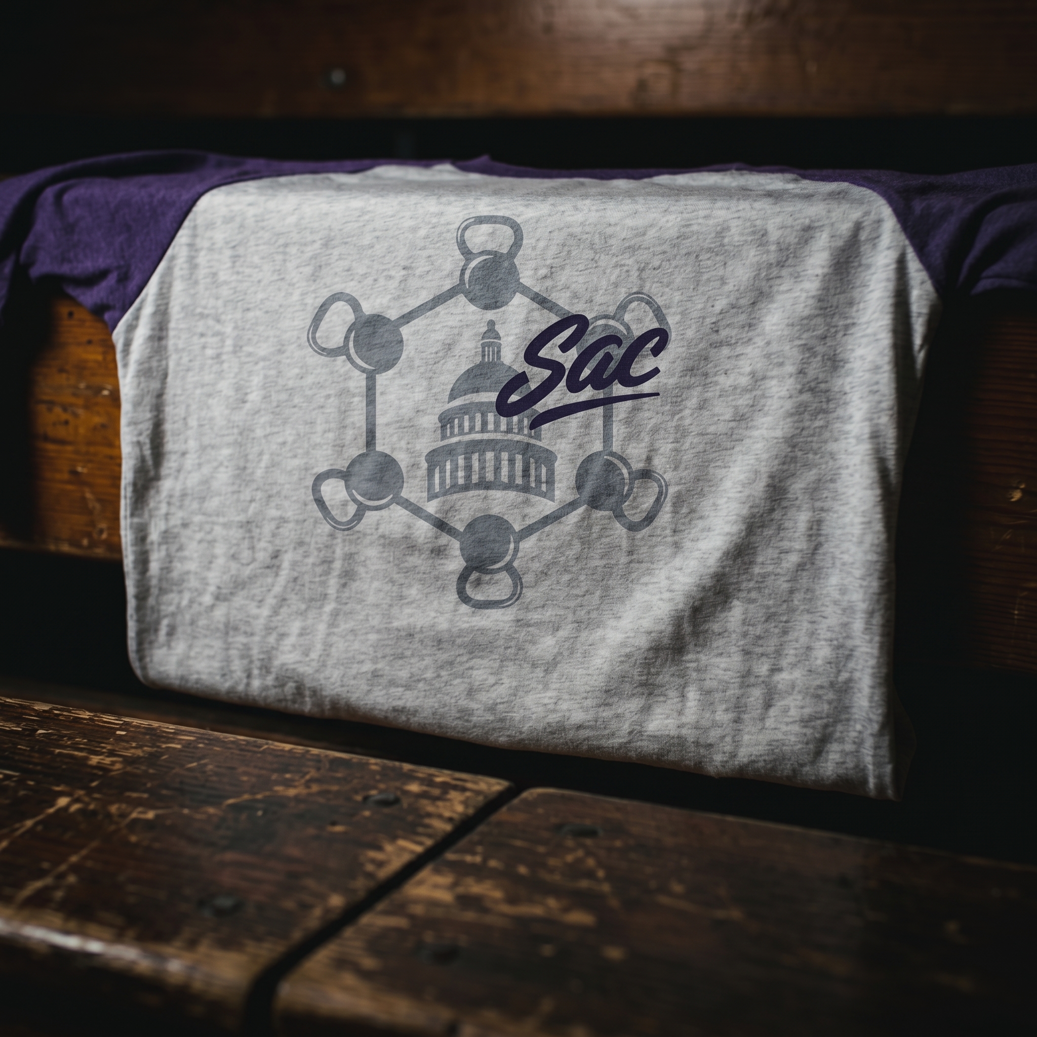 Purple SACrifice Gym shirt with Capitol dome and kettlebell network graphic