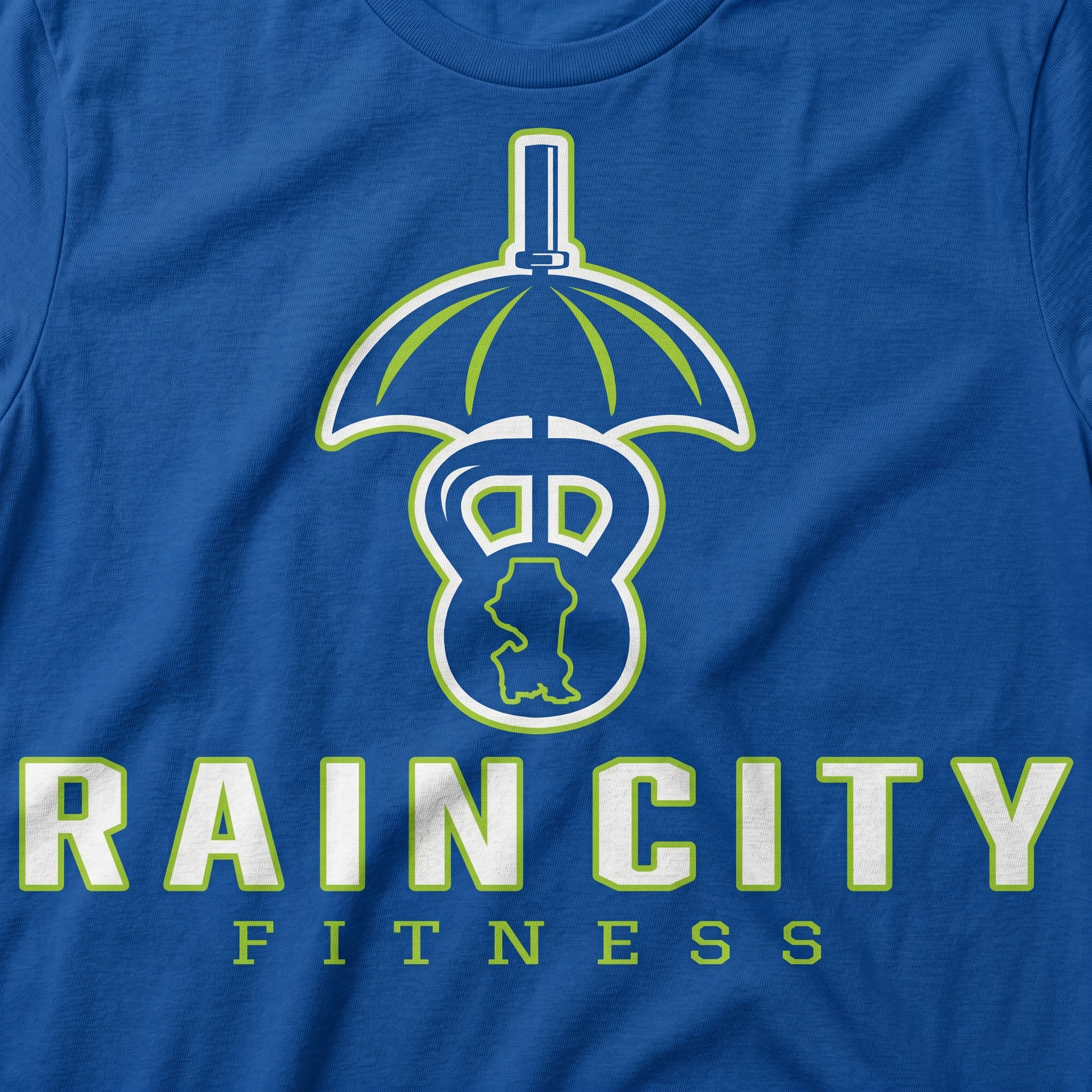 Rain City Fitness screen print logo detail with umbrella kettlebell icon, Washington state silhouette, blue shirt, and green white type