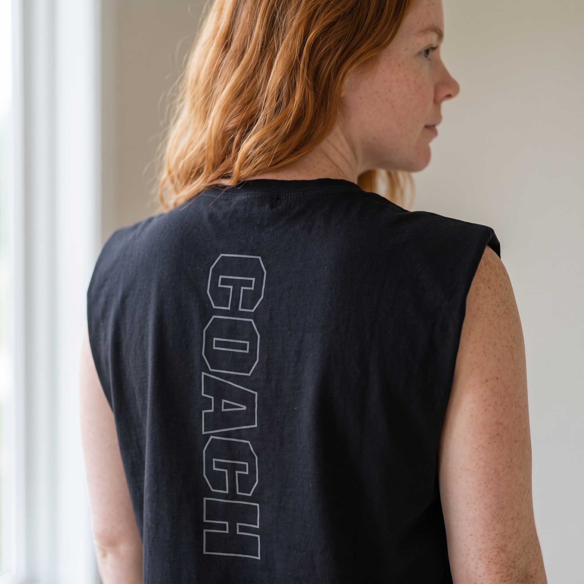 Black Dominion coach muscle shirt with tonal vertical coach back print