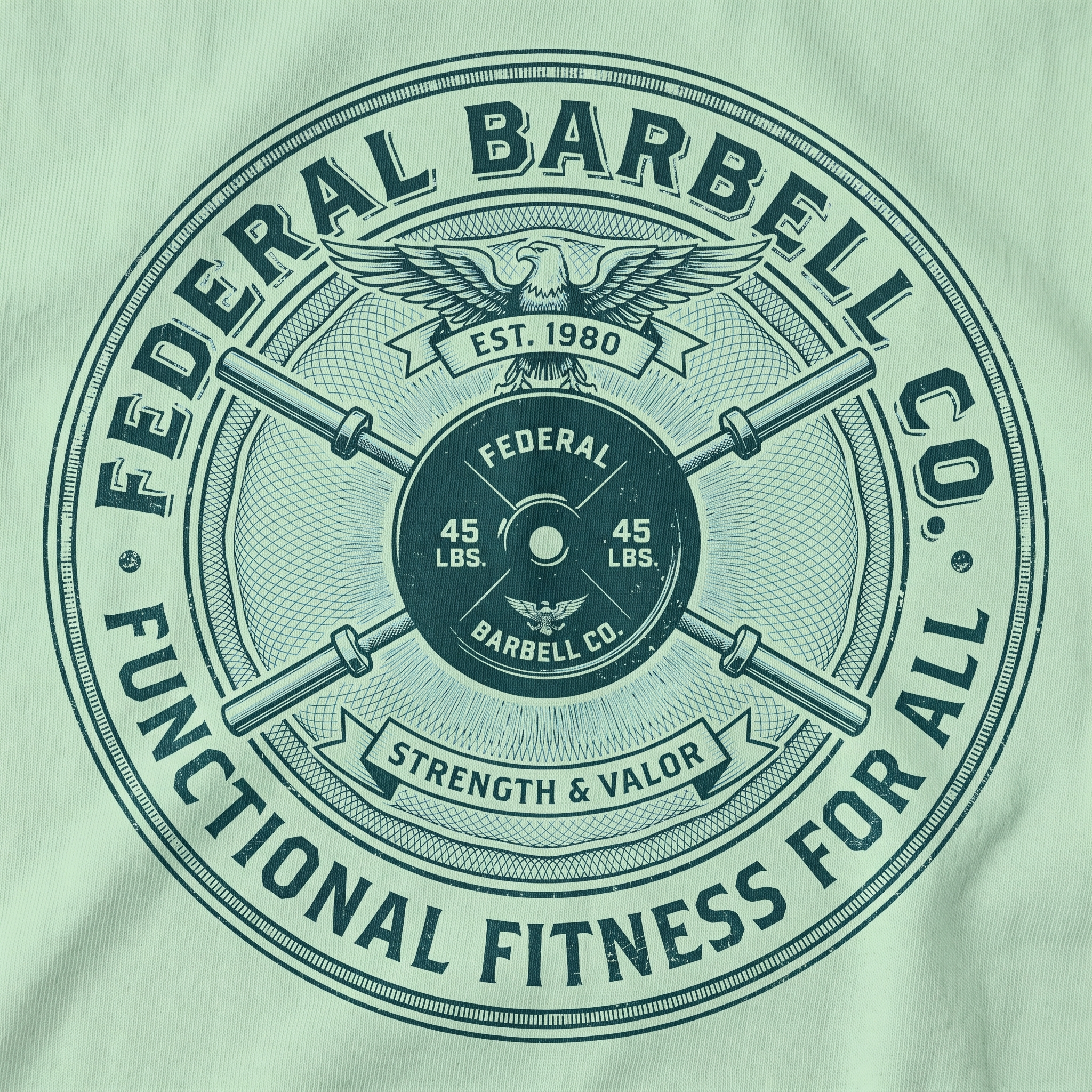 Federal Barbell Co. screen print logo detail with circular seal, eagle, barbells, weight plate, and mint green garment base