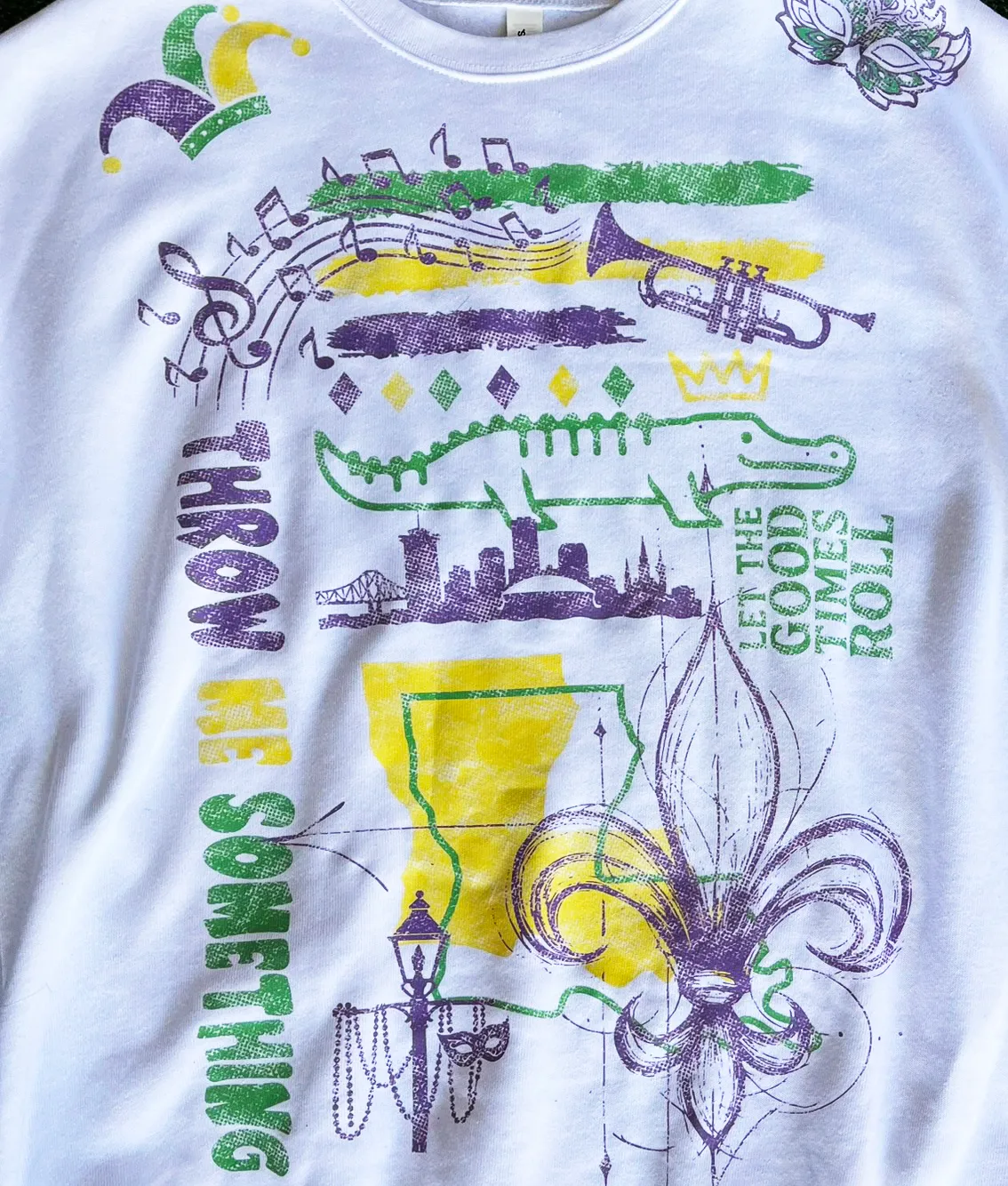 UNITEE Mardi Gras allover print apparel