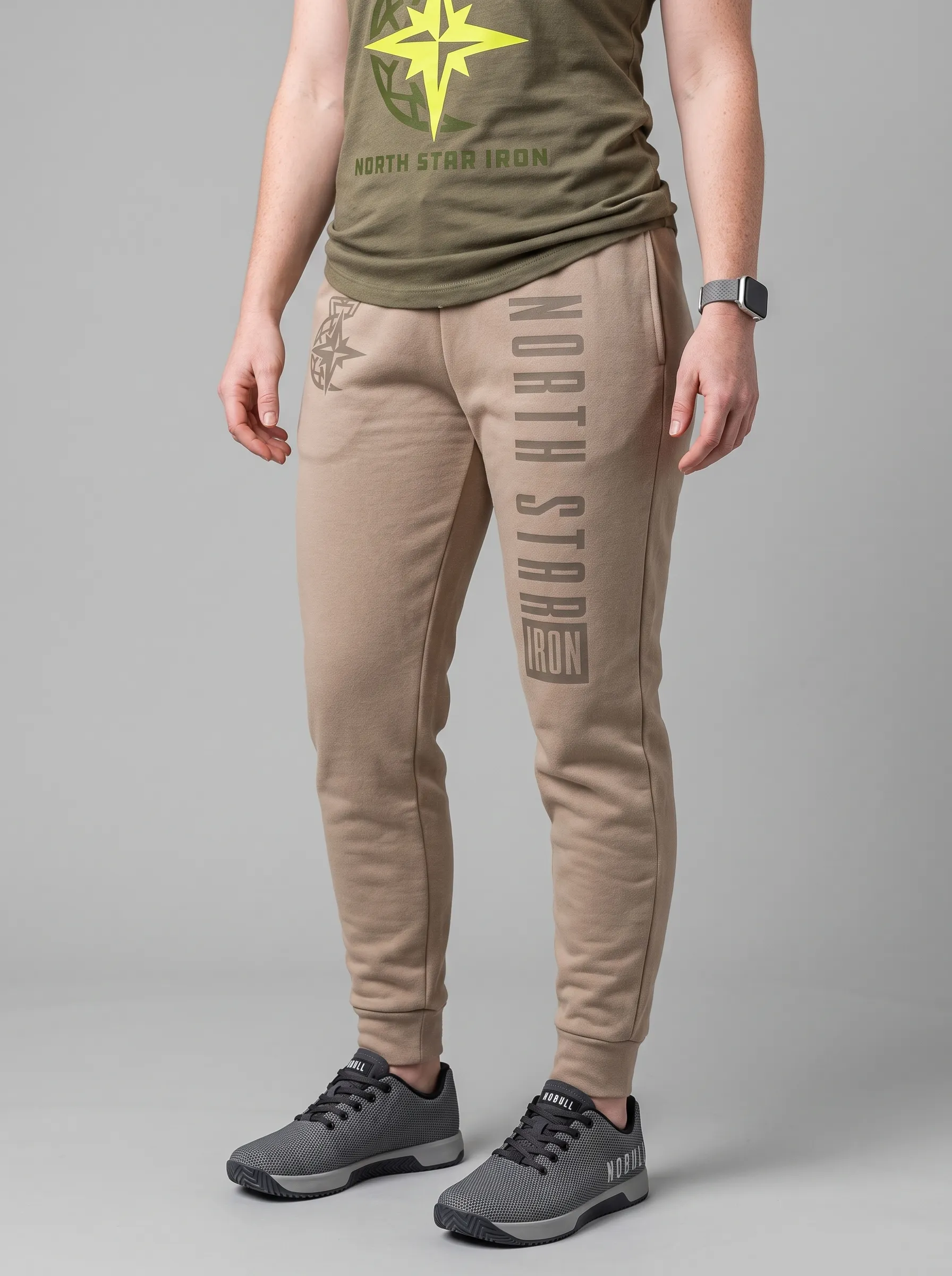 North Star Iron khaki joggers with vertical leg print and star mark