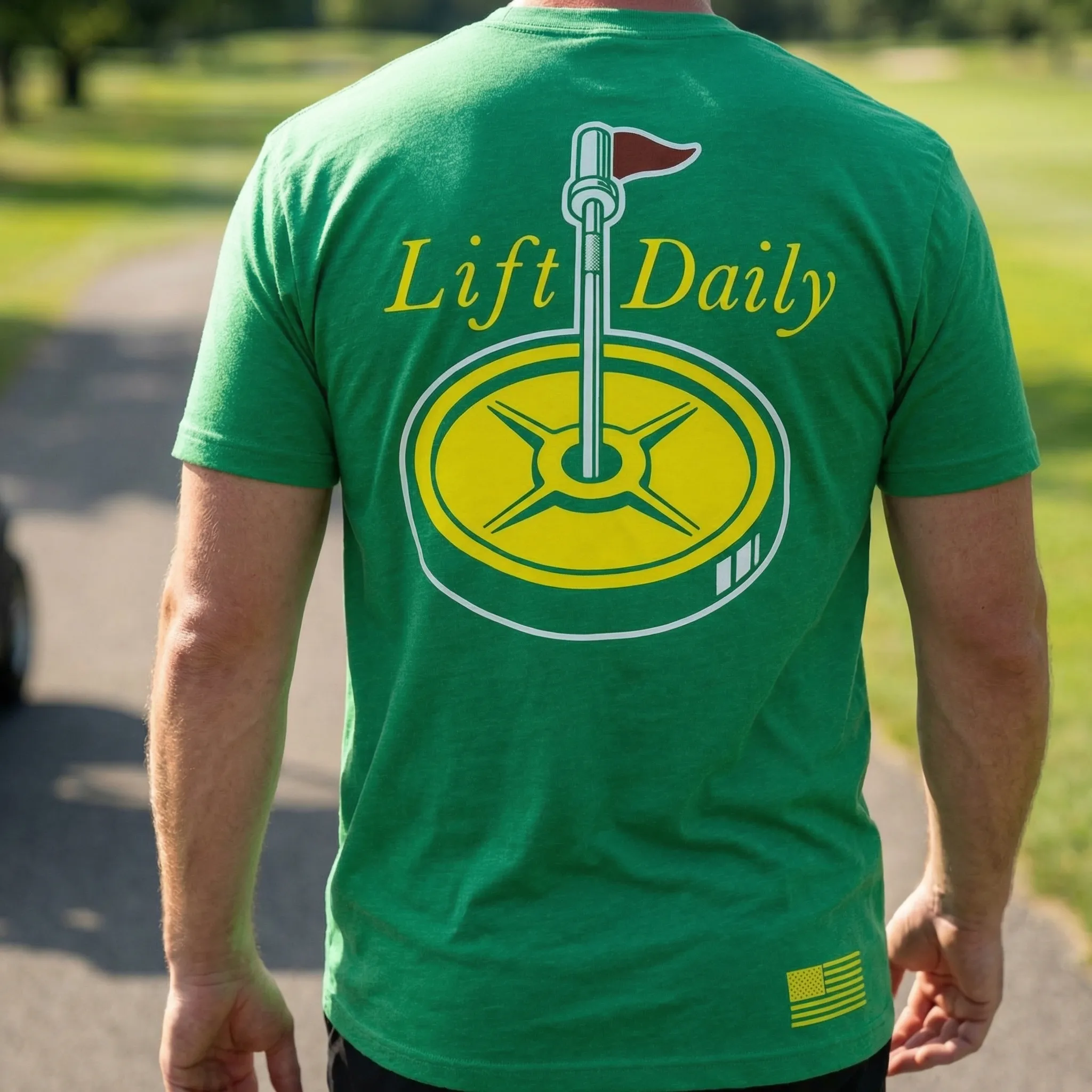 Athlete wearing the green Full Tilt Lift Daily gym shirt