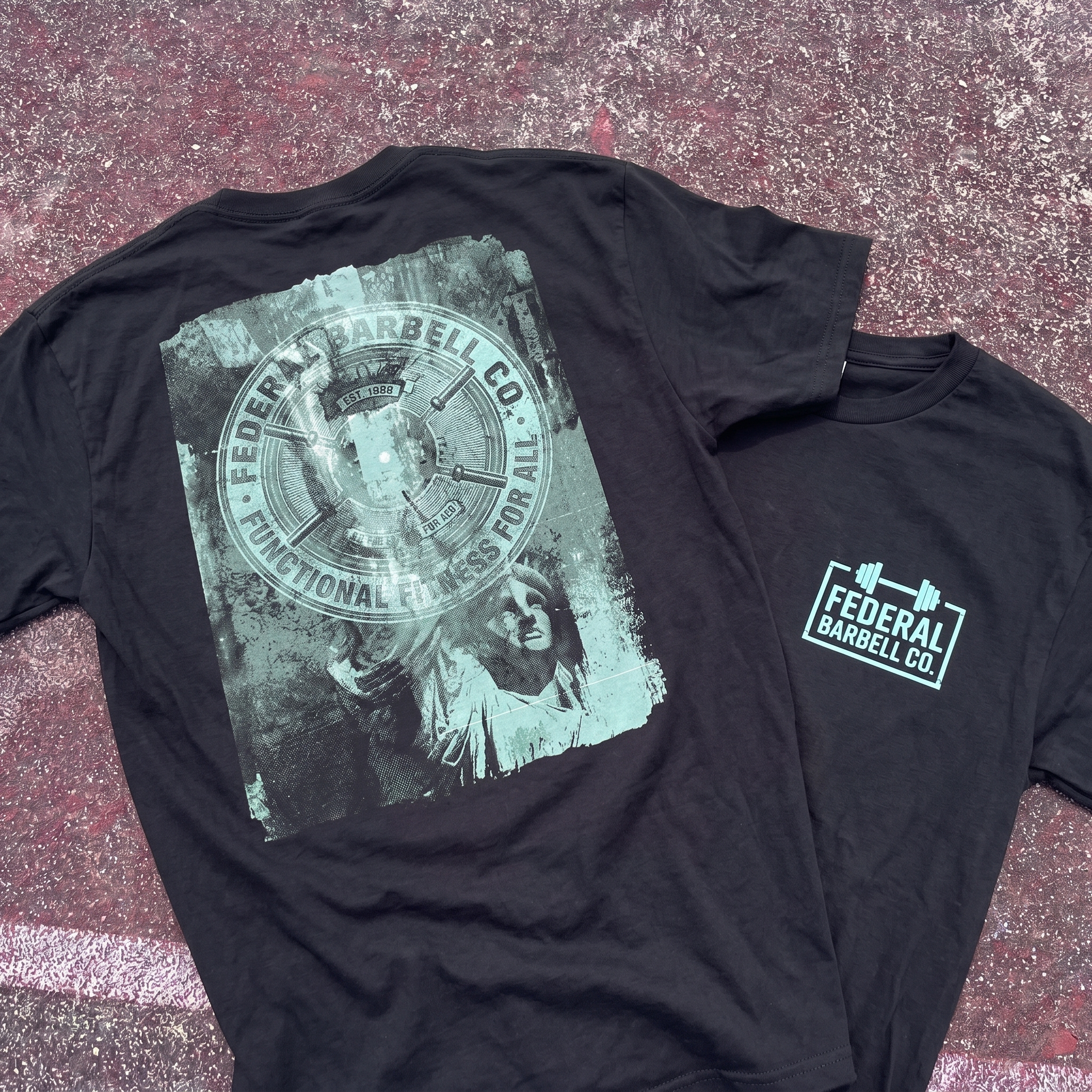 Black Federal Barbell Co. tee with large distressed circular seal and documentary style image texture