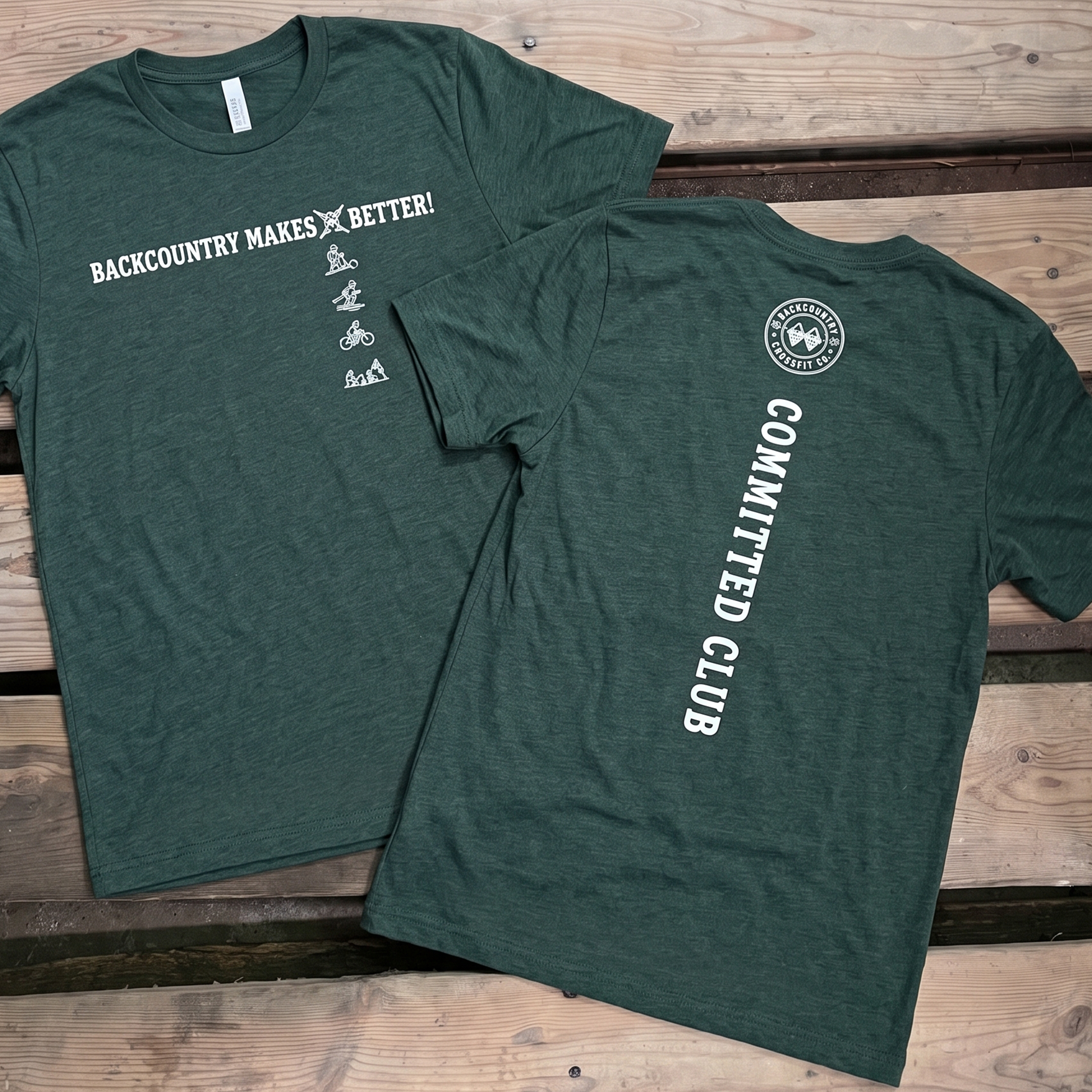 Forest green BackCountry CrossFit tees with white outdoor-themed front and back prints.