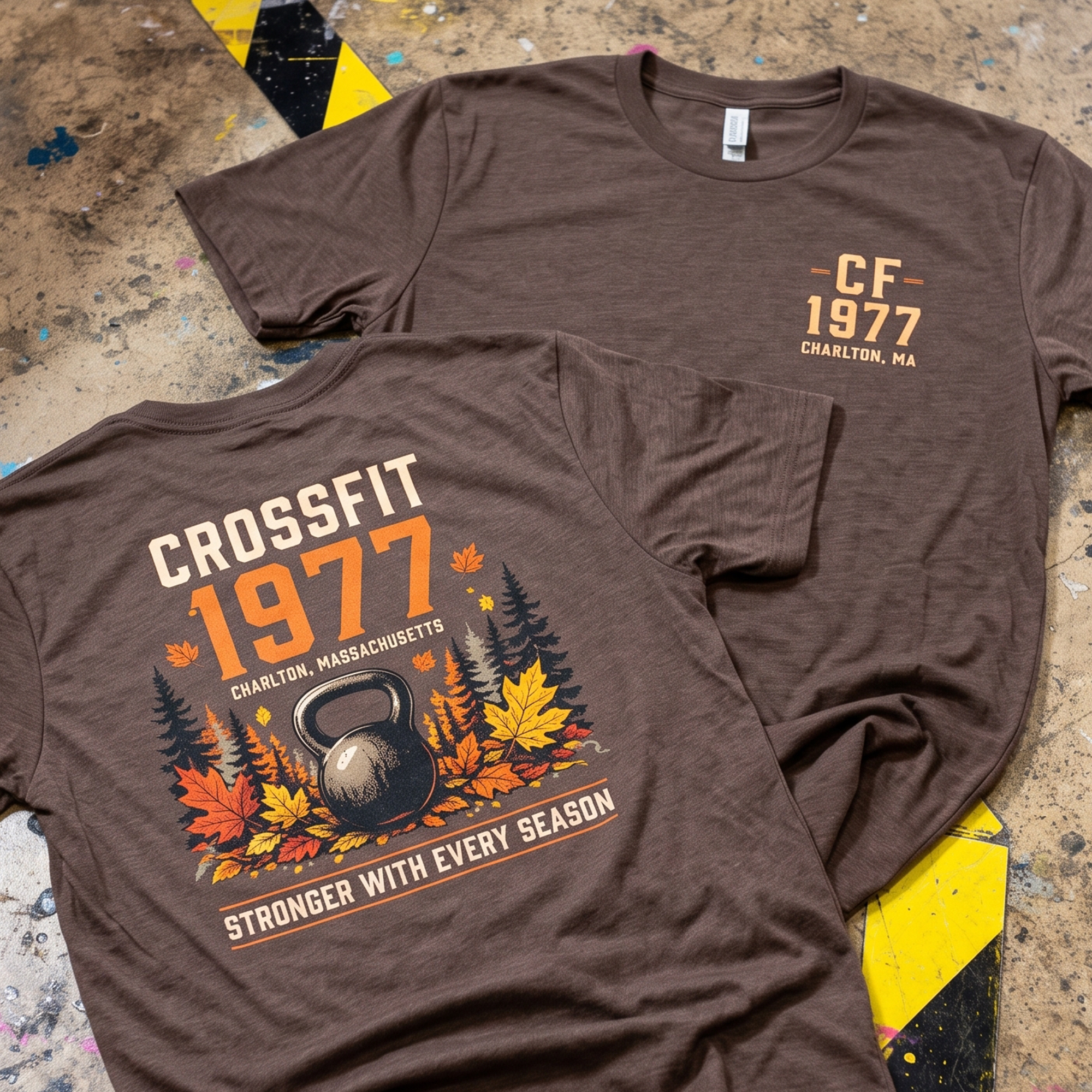 Brown CrossFit 1977 T-shirts with autumn kettlebell back graphic and small chest print.