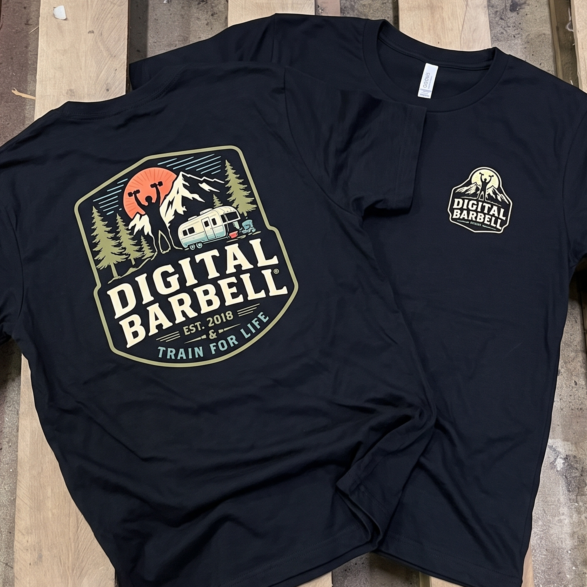 Black Digital Barbell T-shirt with large retro mountain, camper and lifter back graphic plus small chest logo.