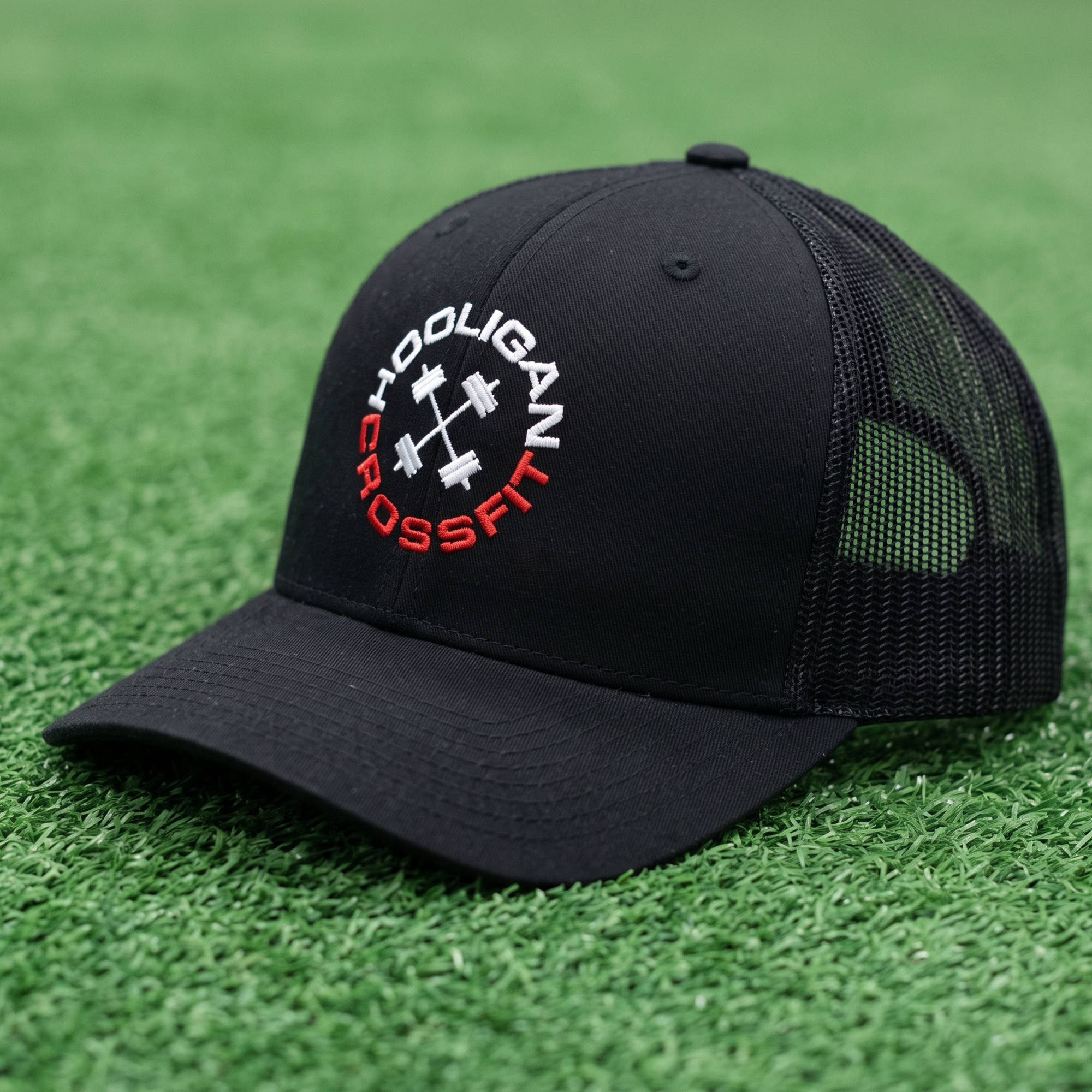 Black mesh trucker hat with embroidered red and white Hooligan CrossFit logo.