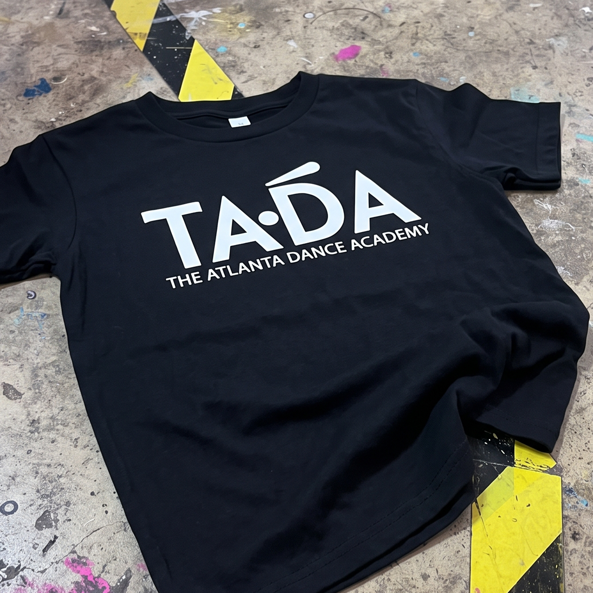 Black T-shirt with white TADA Atlanta Dance Academy front logo.