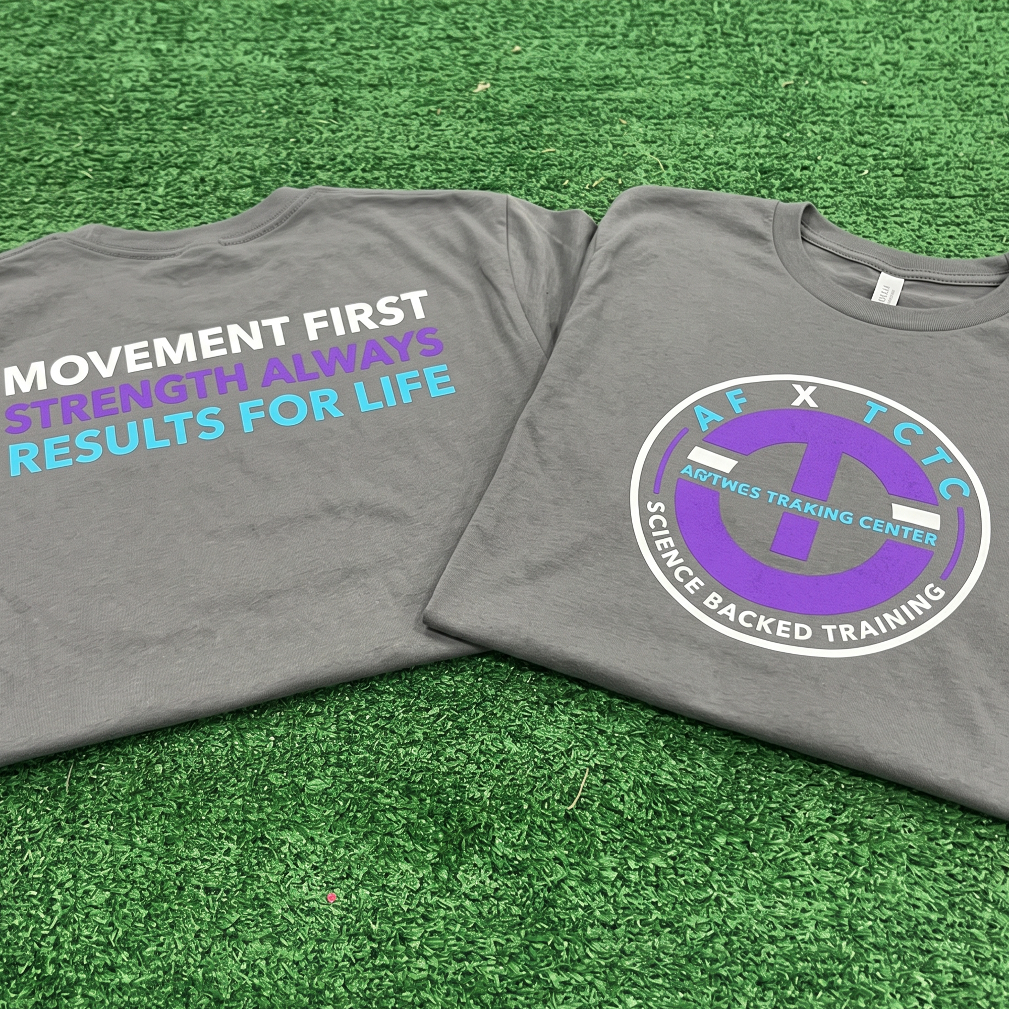 Charcoal Tony Cress Training Center tees with cyan, purple and white front and back prints.