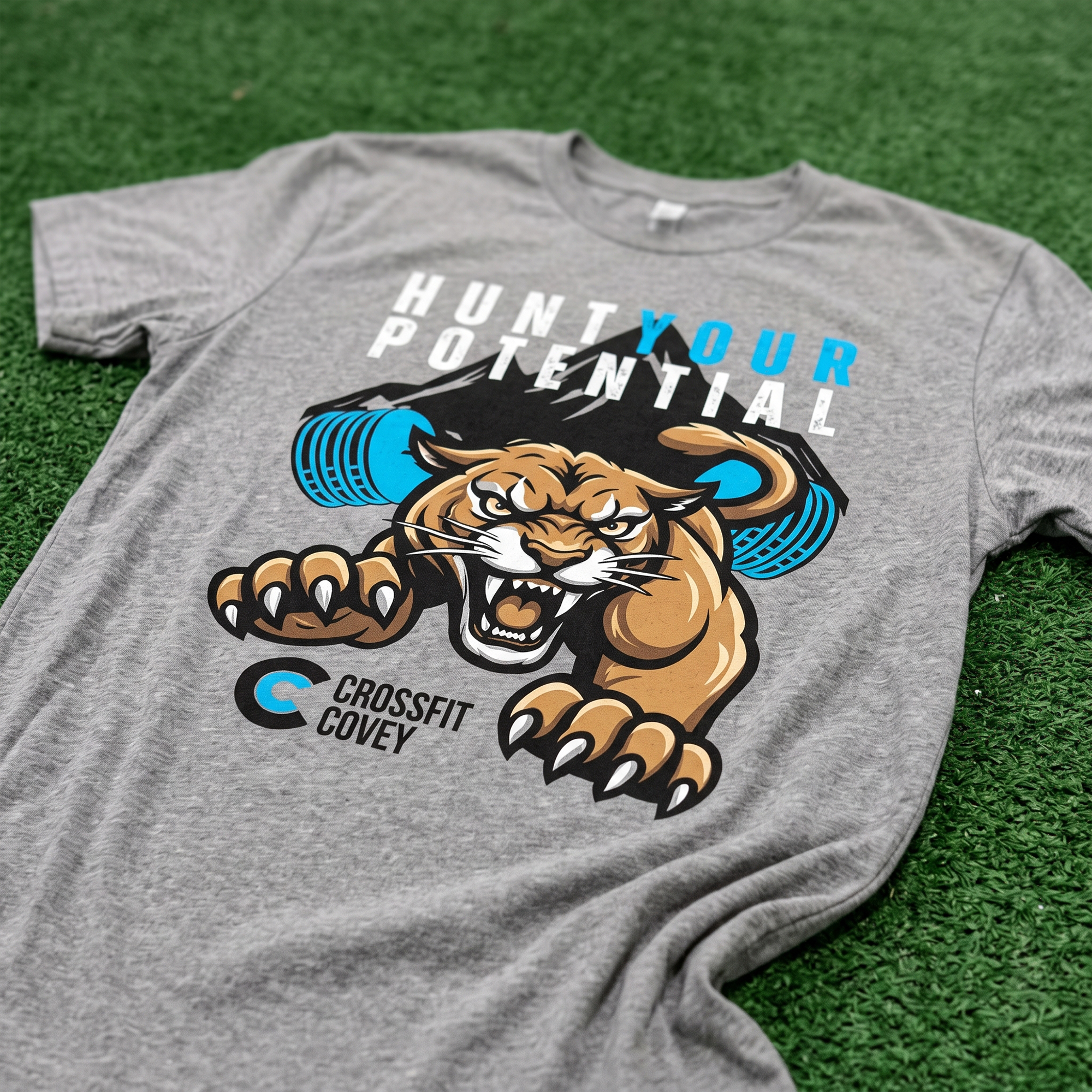 Heather gray T-shirt with roaring cougar and blue barbell graphic