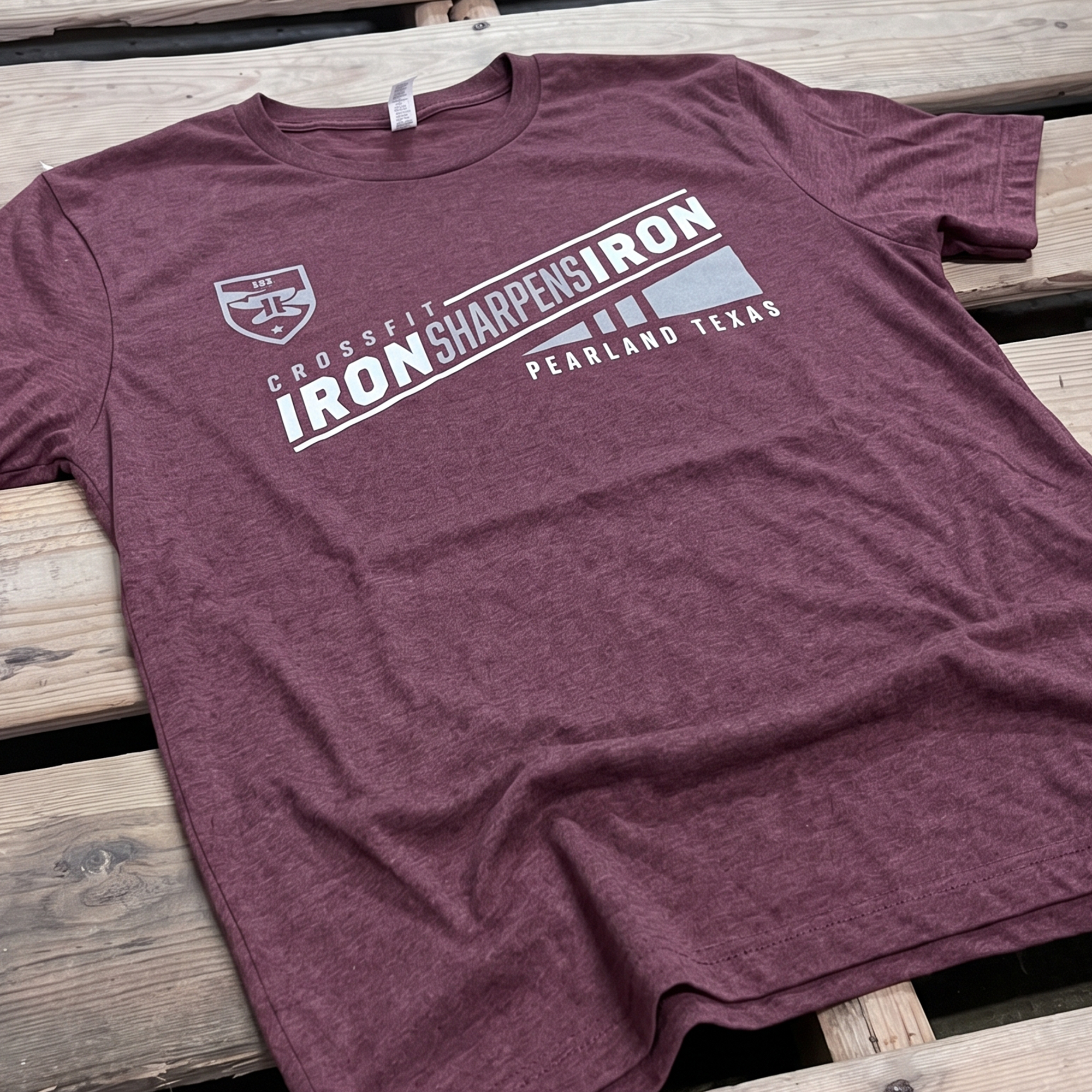 Heather maroon tee with diagonal CrossFit Iron Sharpens Iron graphic