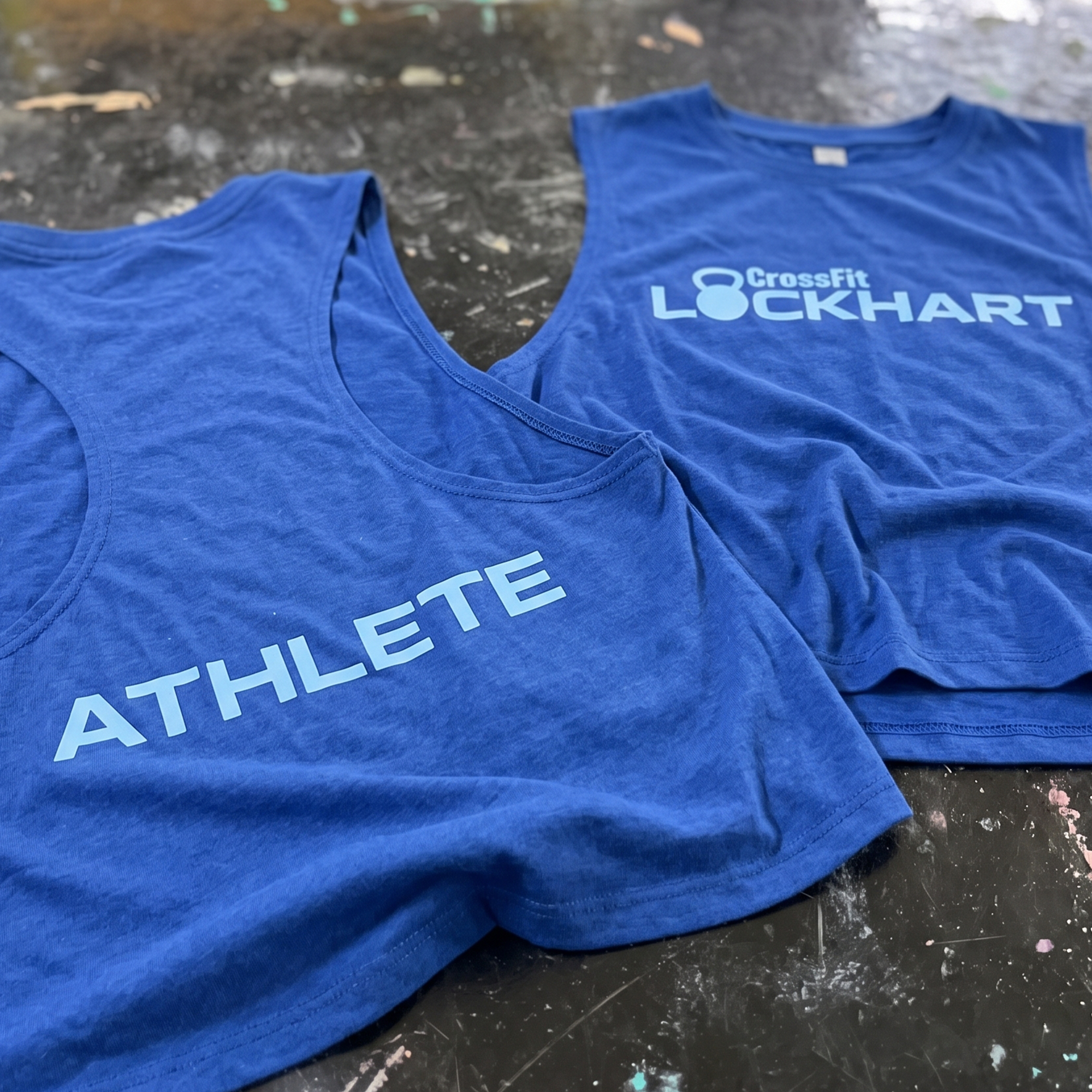 Royal blue tank and tee with ATHLETE and CrossFit Lockhart prints.