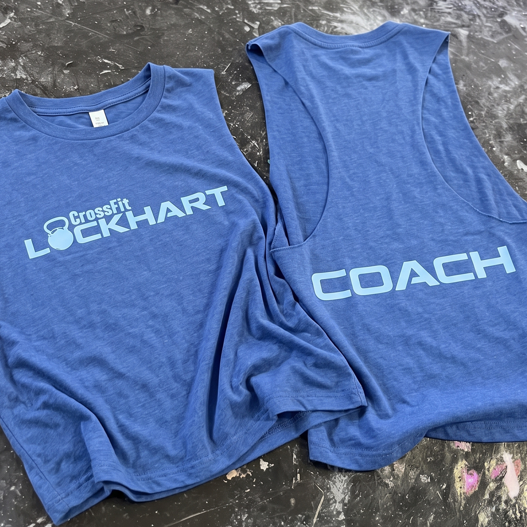 Royal blue tee and tank with light blue CrossFit Lockhart and coach prints.
