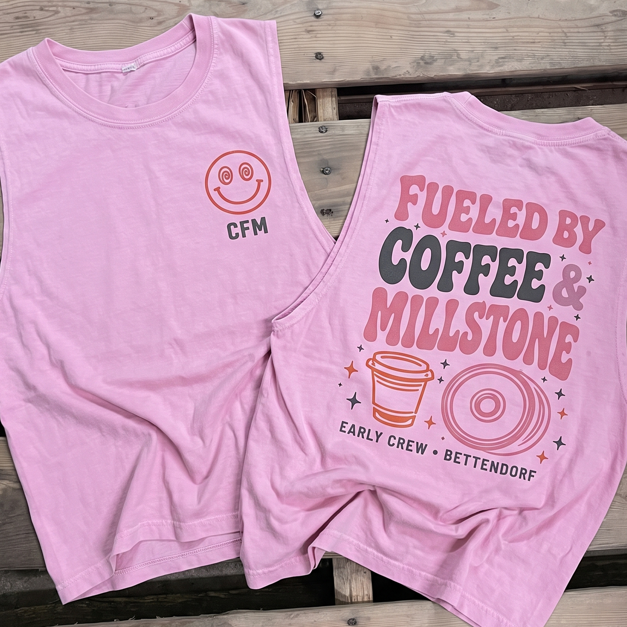 Pink tank with CFM chest mark and Fueled By Coffee & Millstone back print.