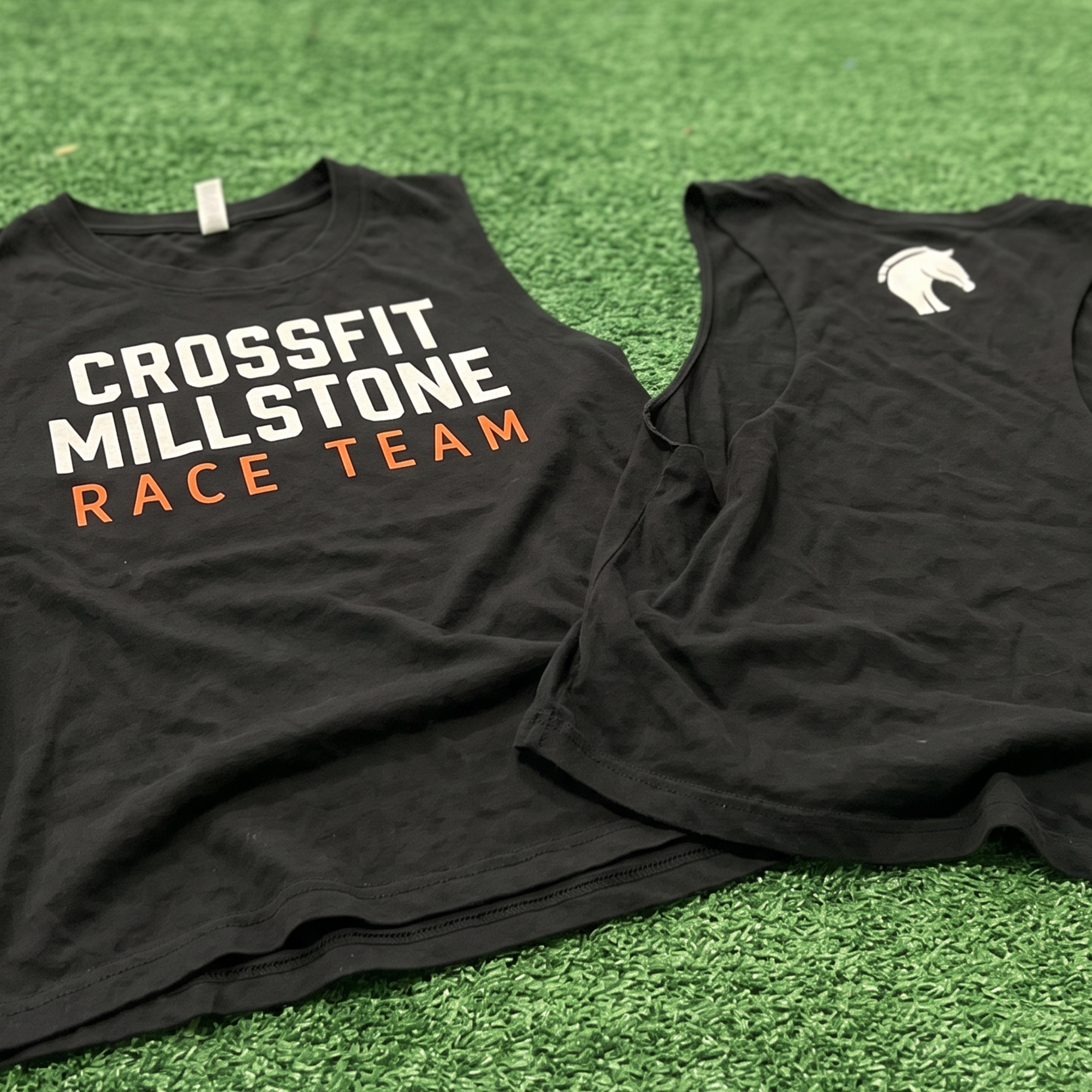 Black tee with white and orange race team front print and horse logo back.