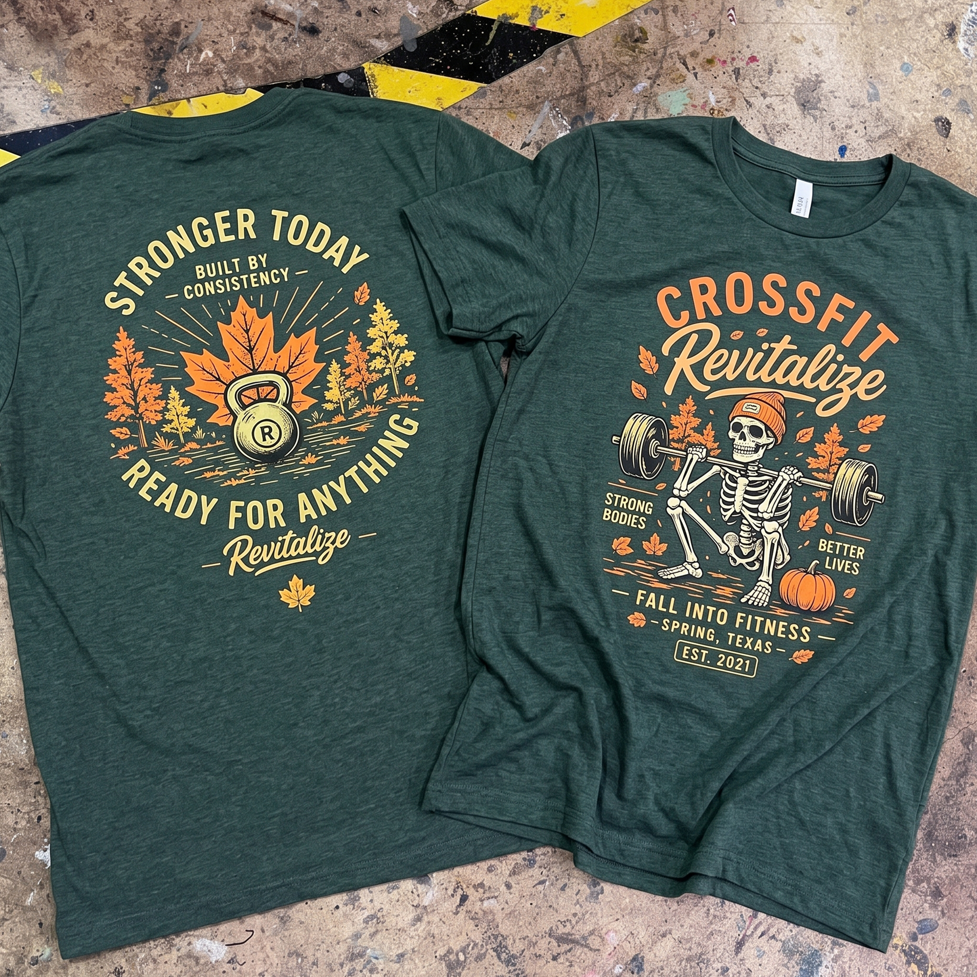 Green shirts showing kettlebell fall back print and skeleton barbell front print.