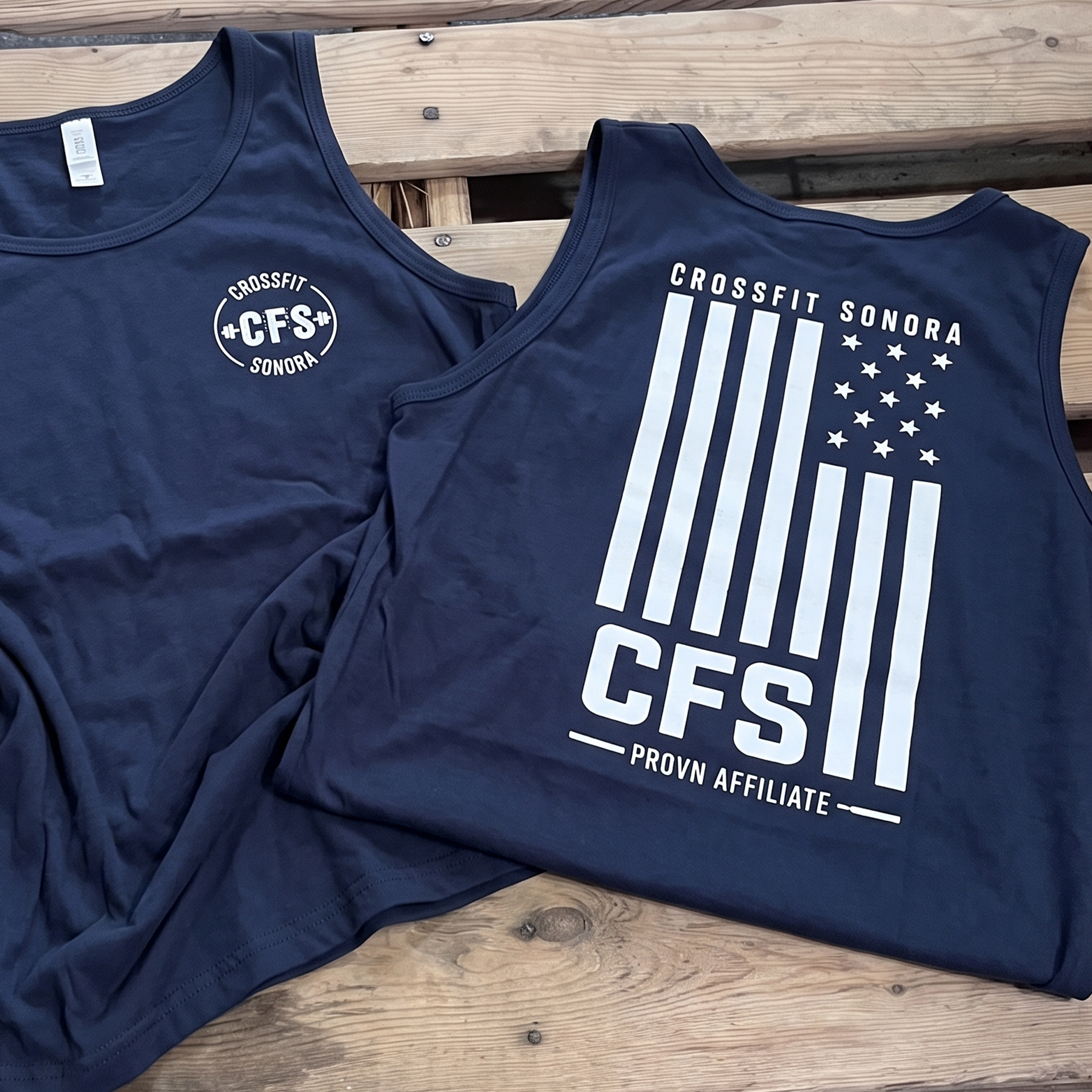 Navy tanks with white CFS chest logo and large flag-inspired graphic.