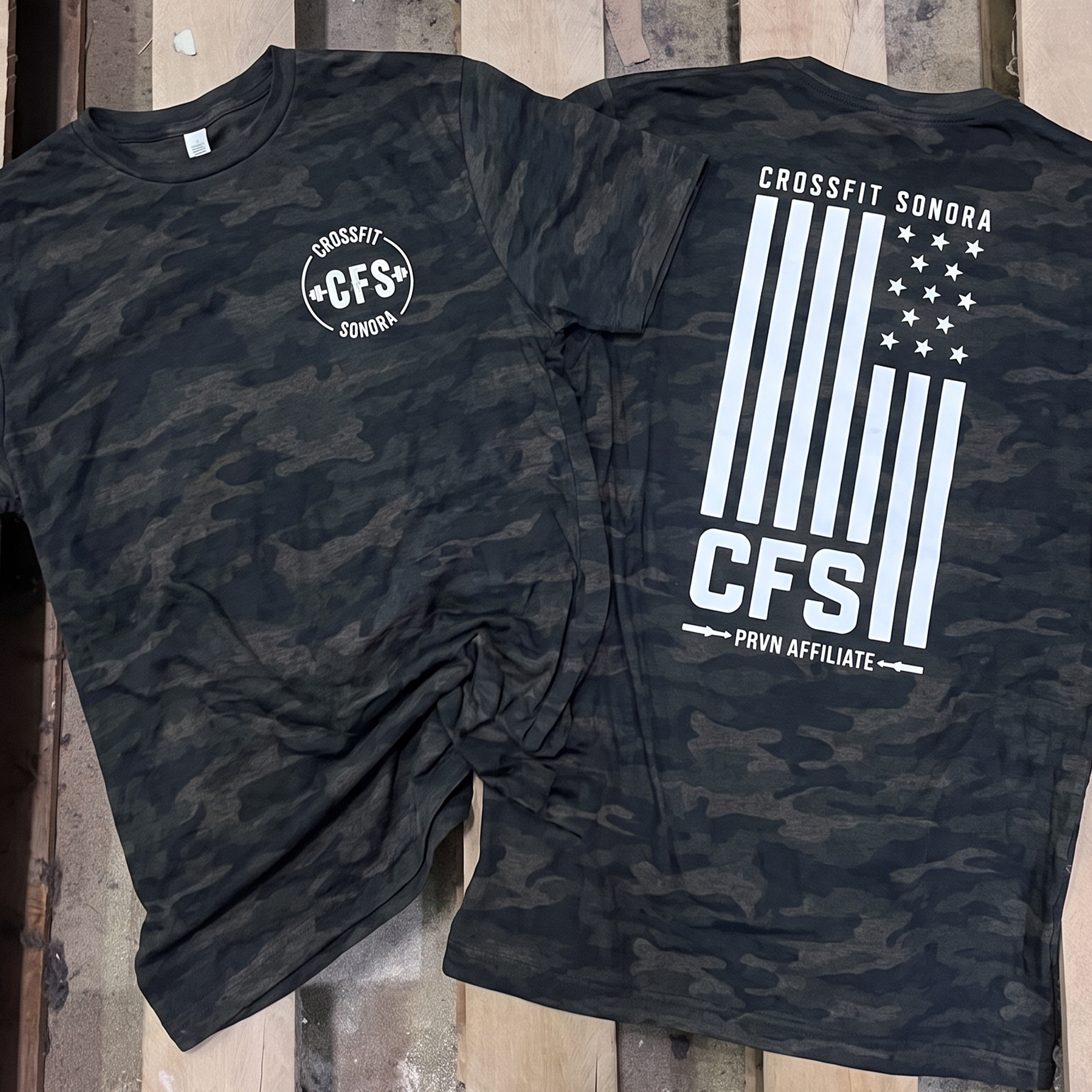 Black camouflage tees with white chest logo and flag-inspired CFS back print.