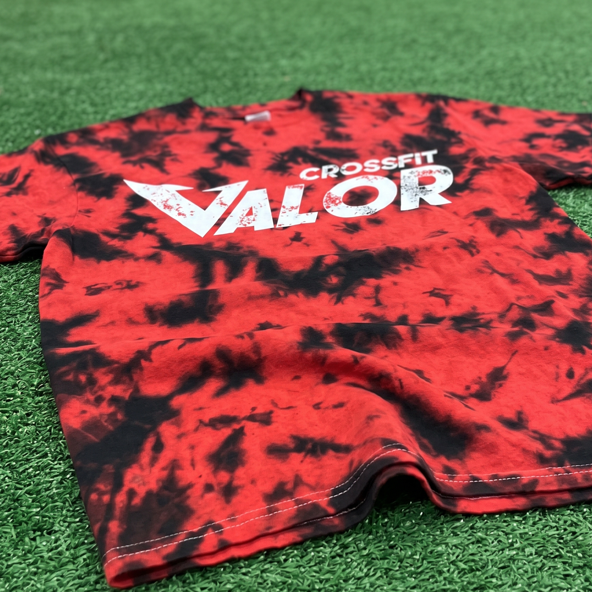 Red and black tie-dye tee with distressed white CrossFit Valor front print.