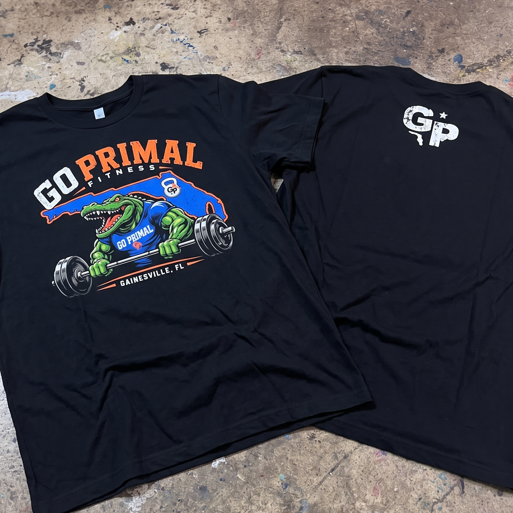 Black Go Primal Fitness tee with gator weightlifting graphic and back GP logo.