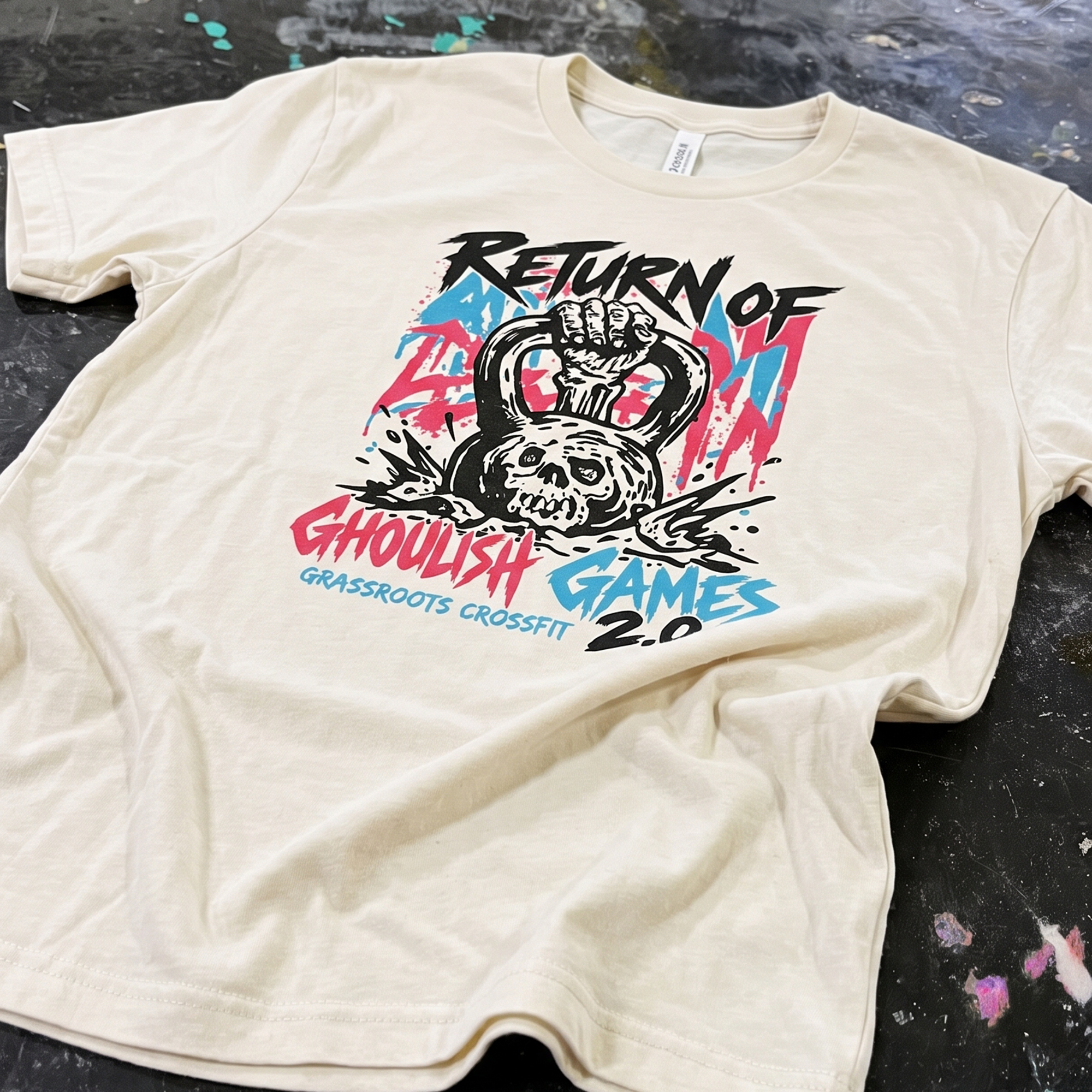 Cream tee with skull kettlebell Ghoulish Games 2.0 graphic