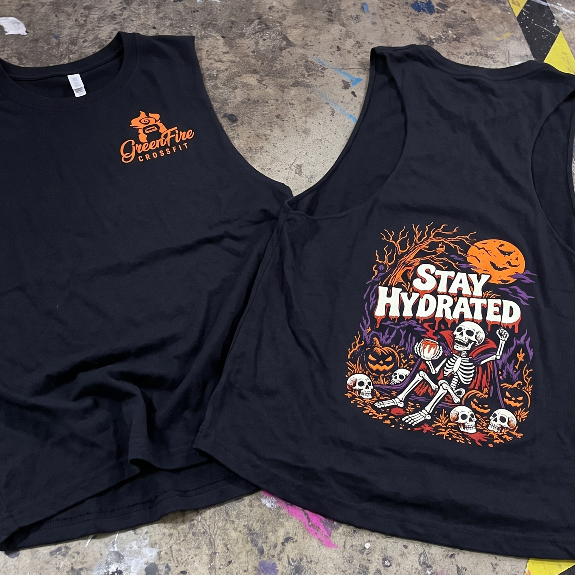 Black tanks with orange chest logo and Stay Hydrated skeleton graphic.