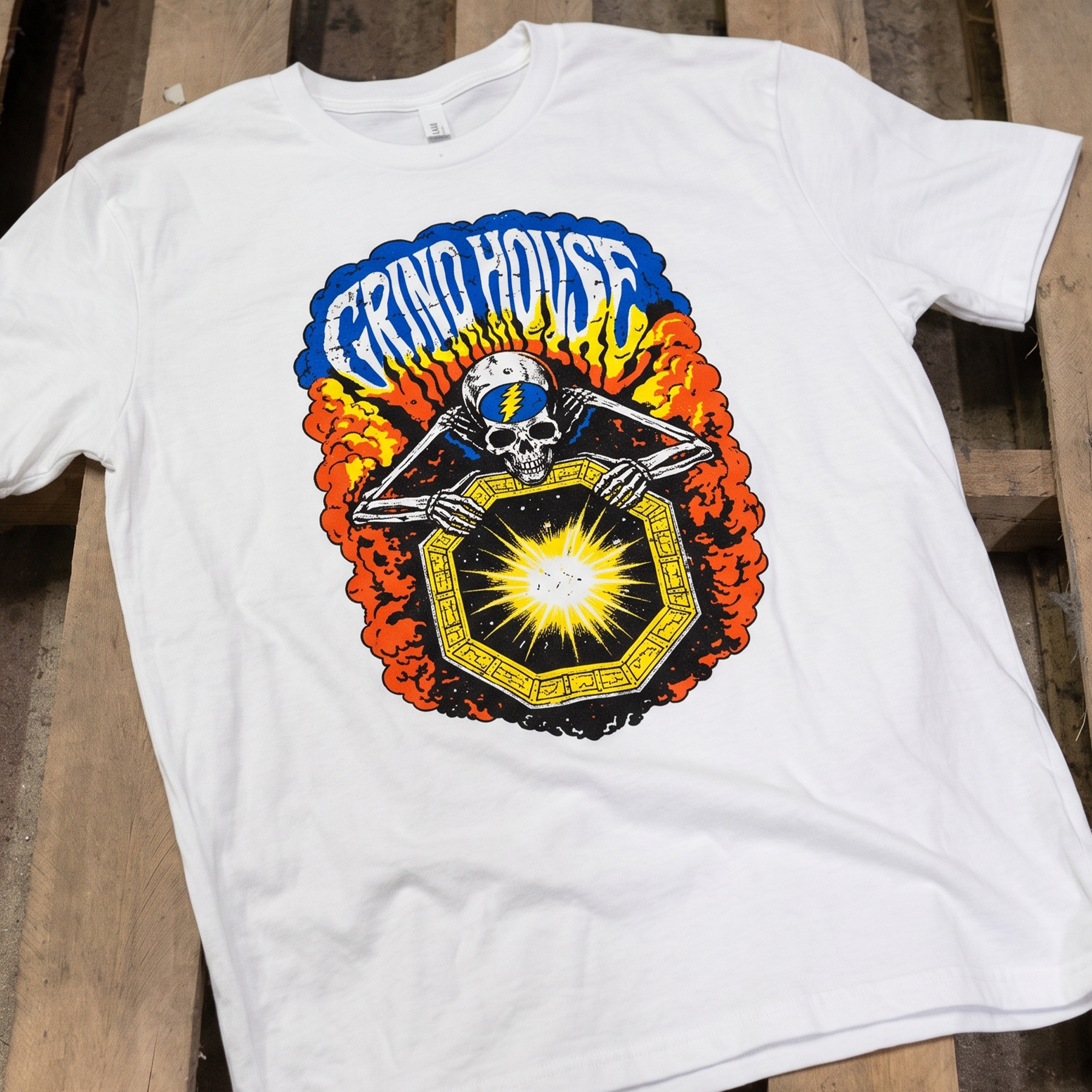 White T-shirt with a colorful Grind House skull and starburst graphic