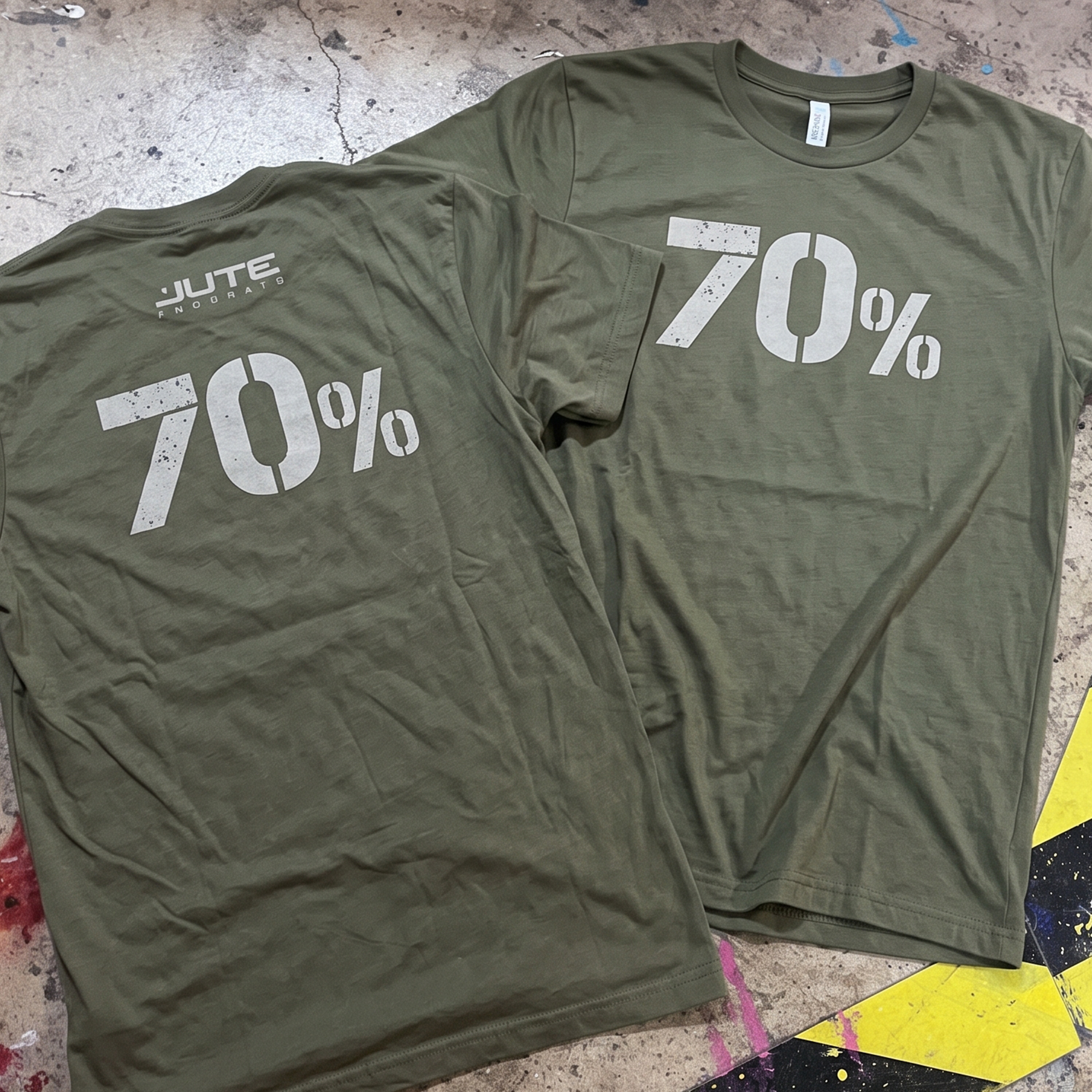 Olive green tees with distressed white 70% graphics and Jute CrossFit back print.