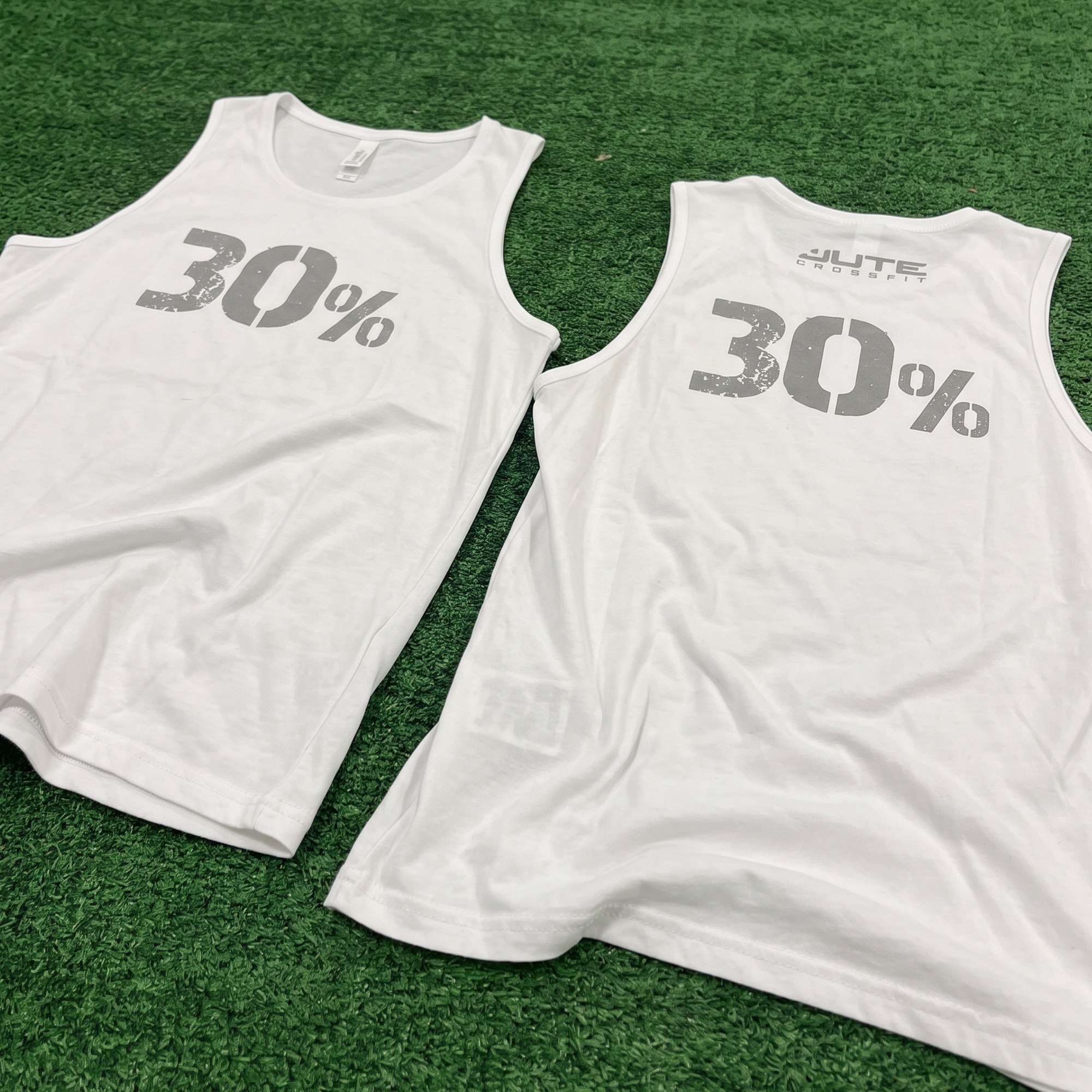 White tanks with distressed gray 30% graphics and Jute CrossFit upper-back print.