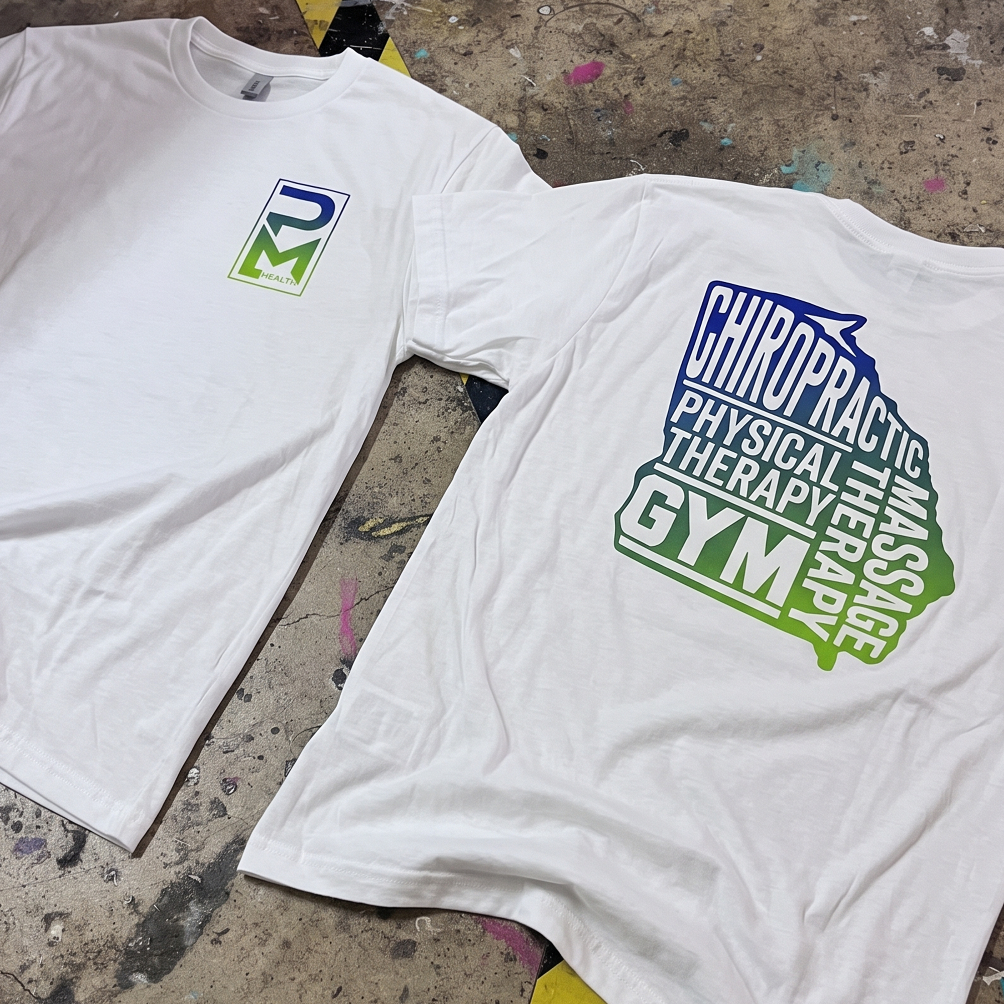 White T-shirts with gradient PM Health chest logos and large stacked back graphics.