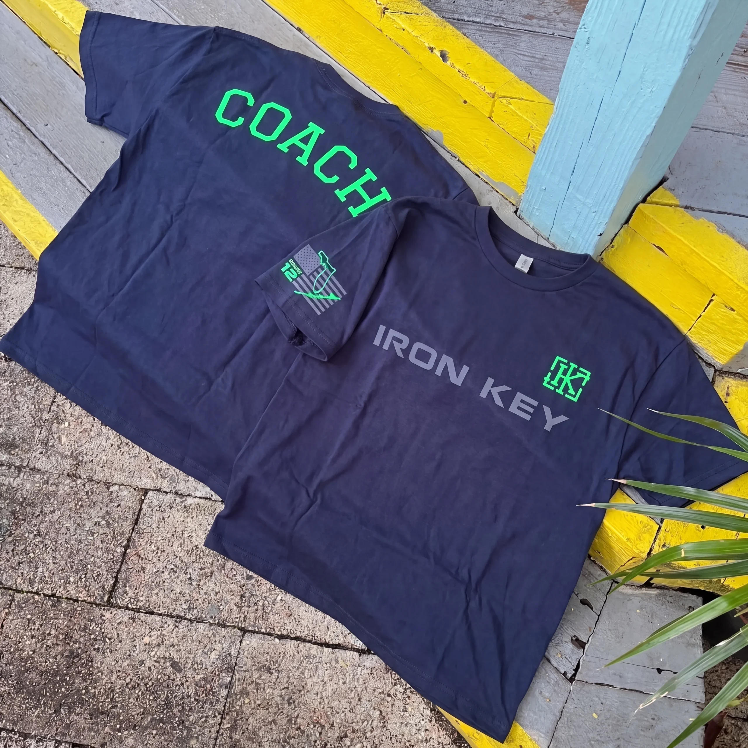 Iron Key Dream Job coach shirt photographed near Key Lime Square