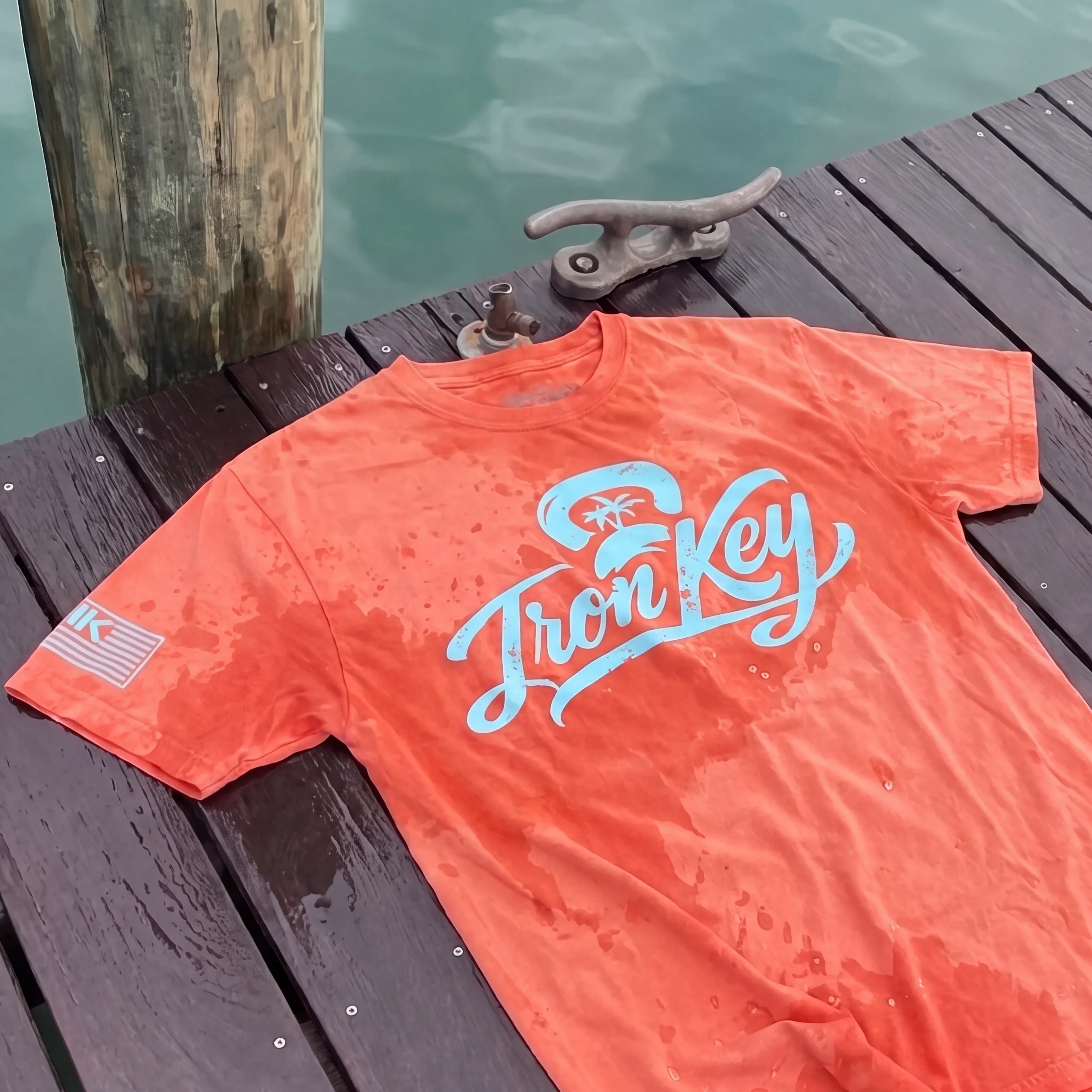 Iron Key Sandbar Strength script shirt photographed near Key West seaport